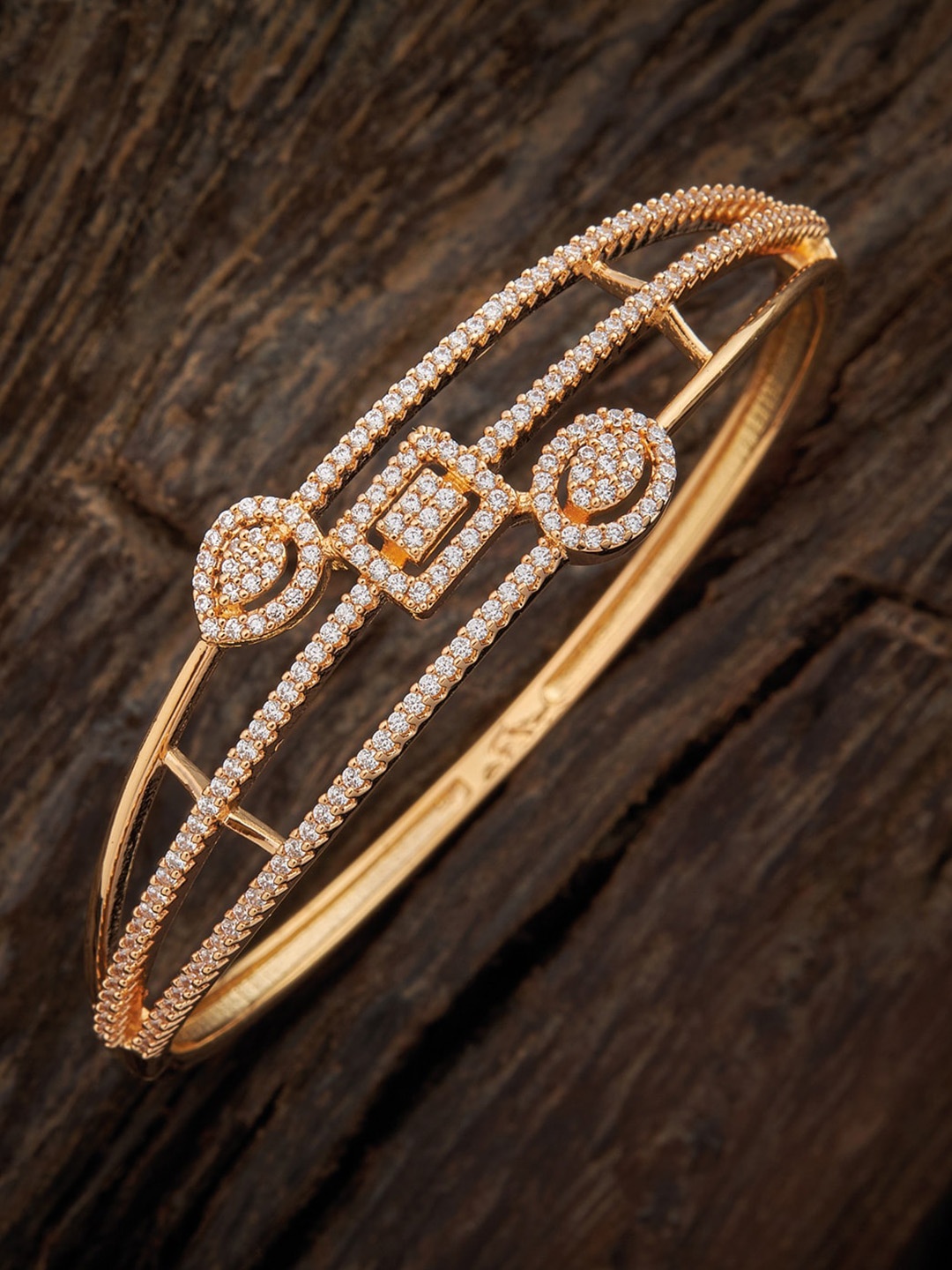 

Kushal's Fashion Jewellery Women Gold-Toned & White Gold-Plated Bangle-Style Bracelet