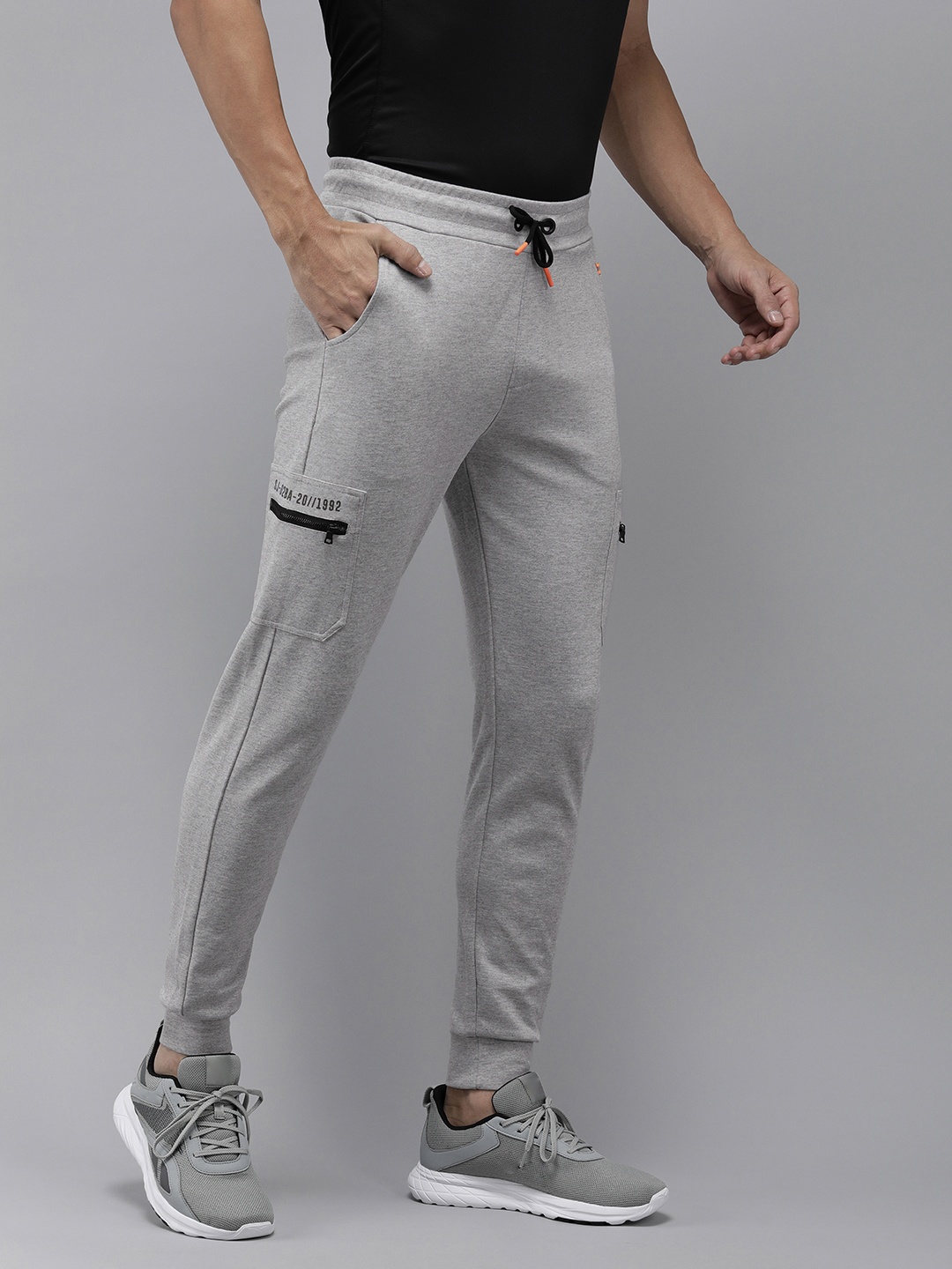 

SPYKAR Men Solid Mid-Rise Slim Fit Cargo Joggers, Grey melange