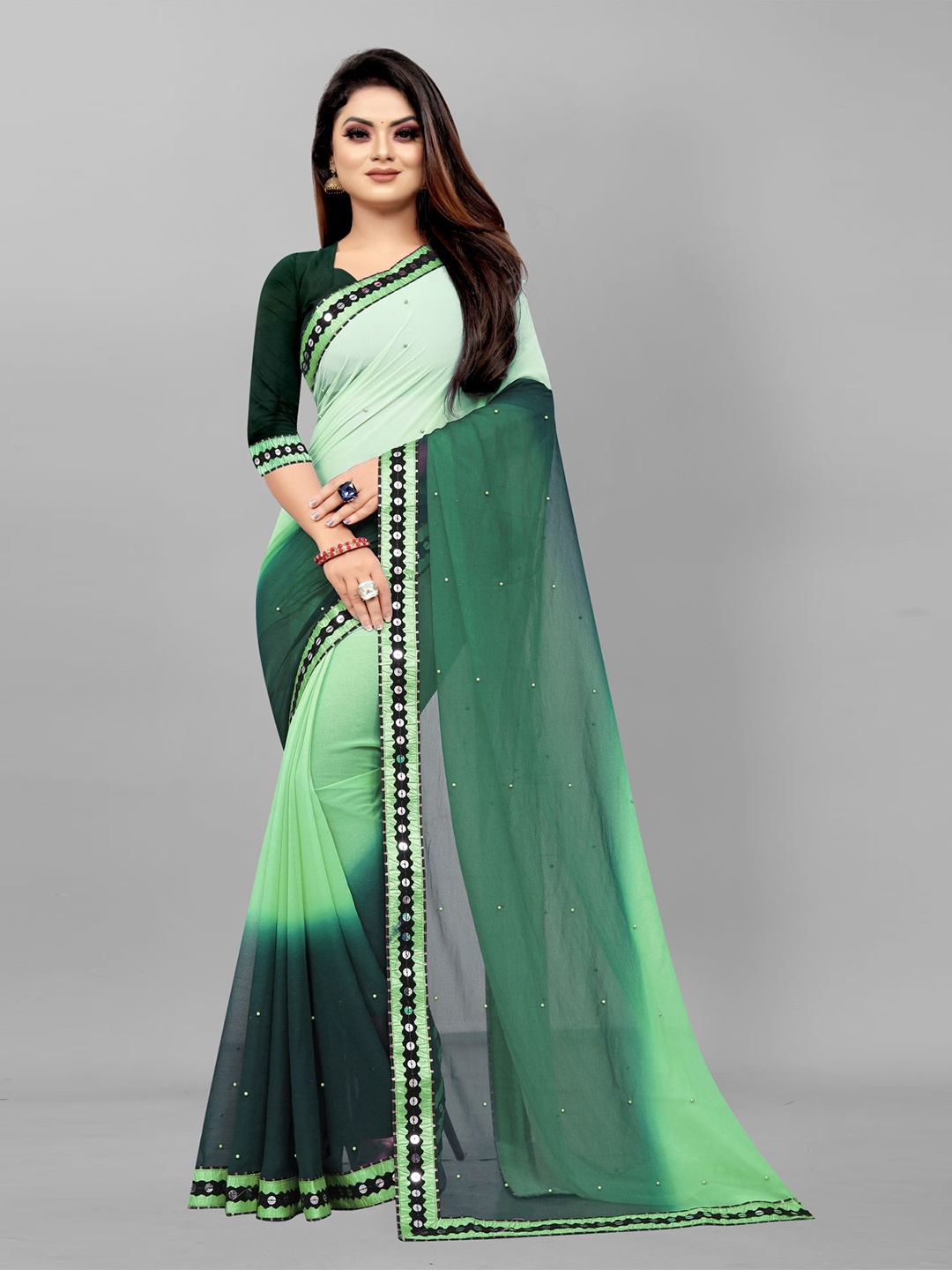 

Queenswear Creation Green Embellished Mirror Work Pure Georgette Saree
