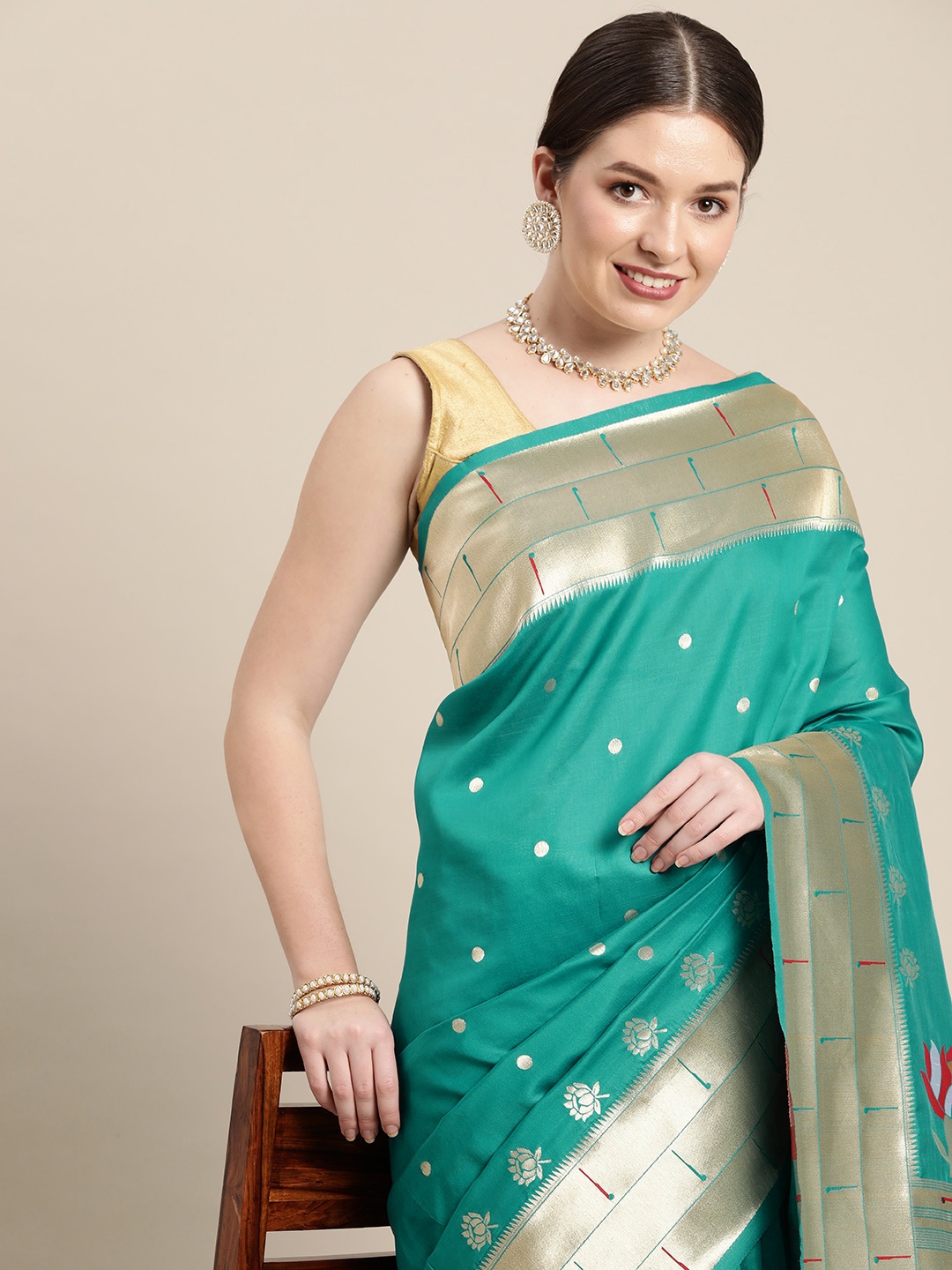 

Mitera Teal & Gold-Toned Floral Zari Silk Blend Paithani Saree