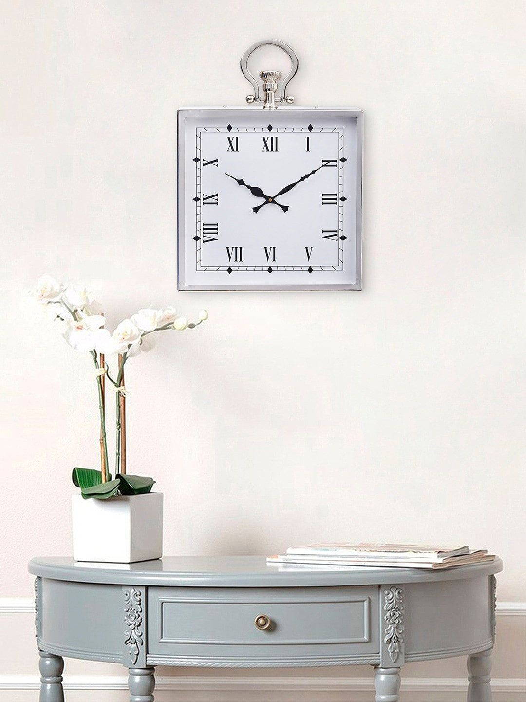 

eCraftIndia Silver-Toned & White Contemporary Wall Clock