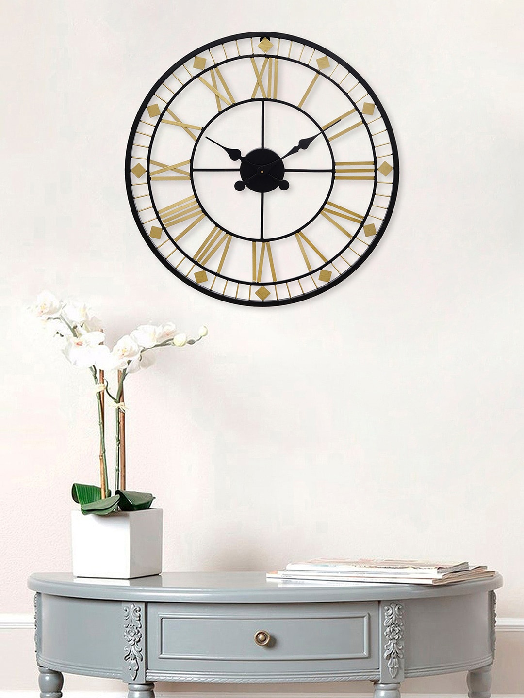 

eCraftIndia Black & Gold-Toned Contemporary Wall Clock