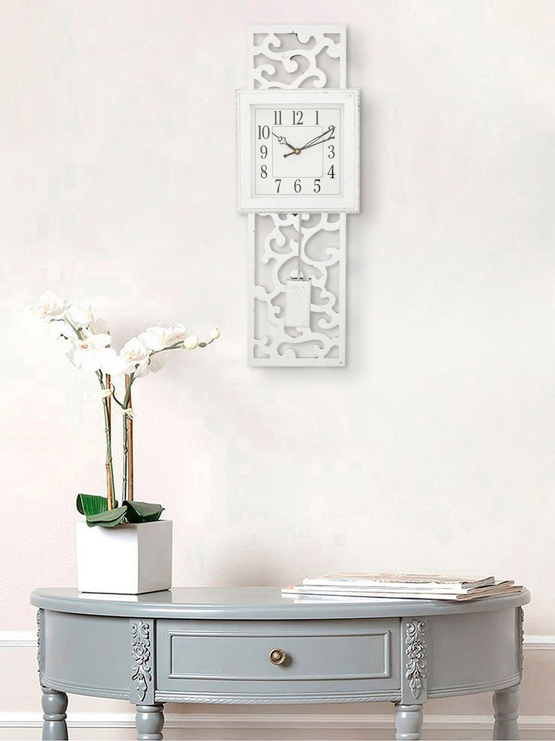 

eCraftIndia Black & Silver-Toned Contemporary Wall Clock