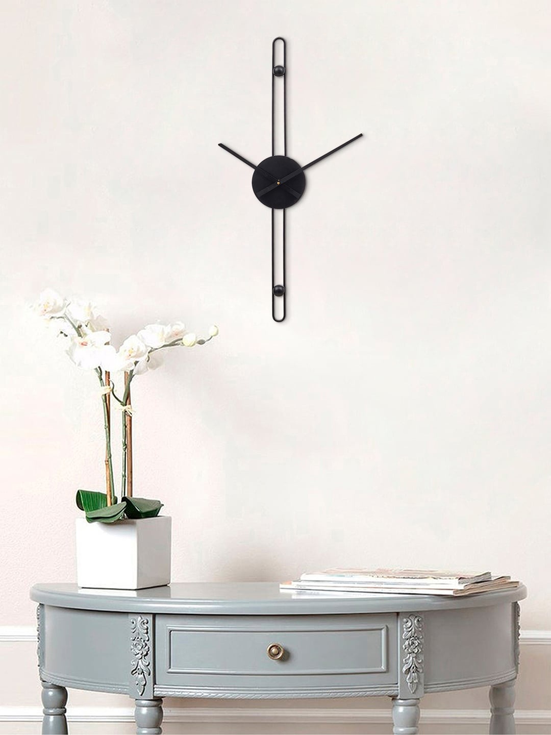

eCraftIndia Black Contemporary Wall Clock