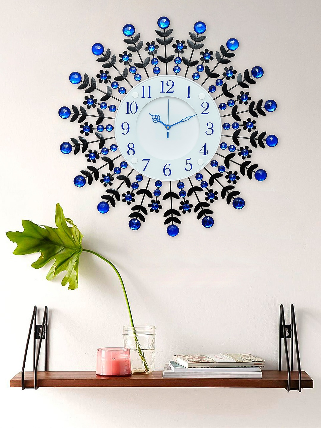 

eCraftIndia Black & Blue Printed Contemporary Wall Clock