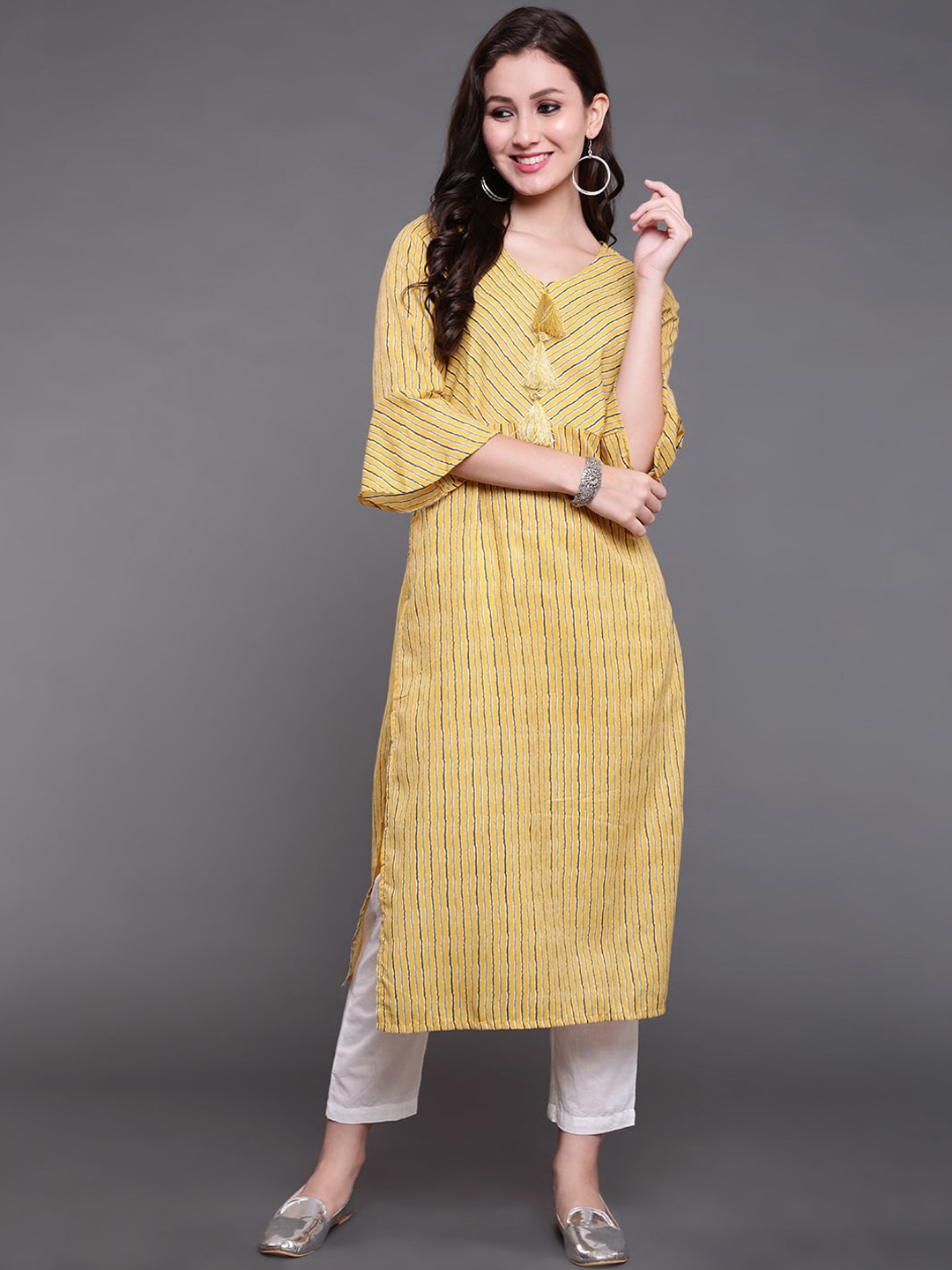 

antaran Women Yellow Striped Bell Sleeves Kurta