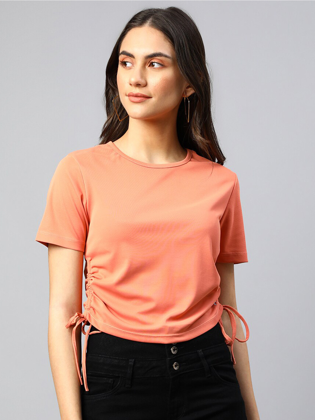 

Xpose Peach Solid Round Neck Crop Side Tie Ups Top