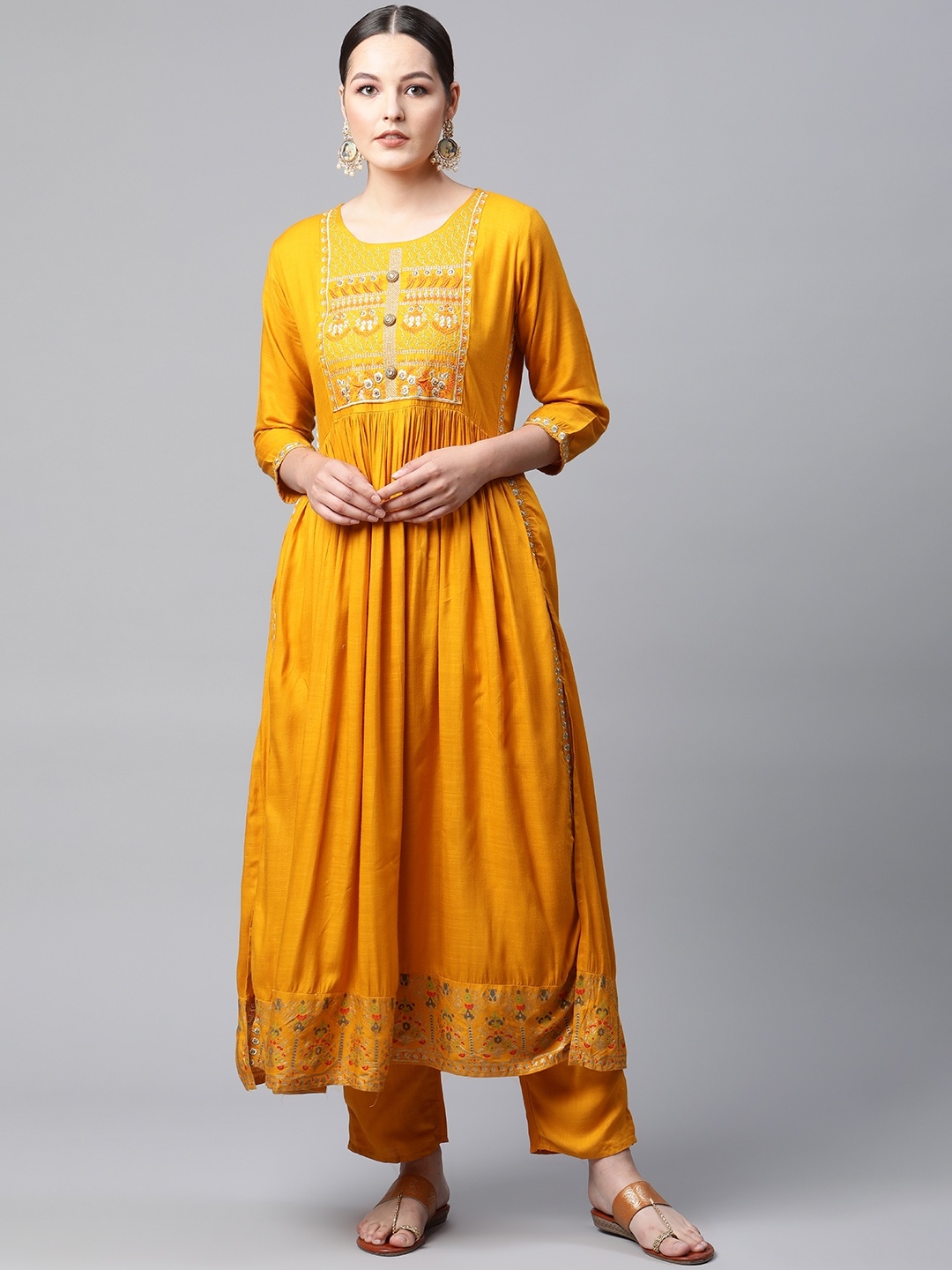 

mokshi Women Mustard Yellow Ethnic Motifs Embroidered Kurta with Trousers