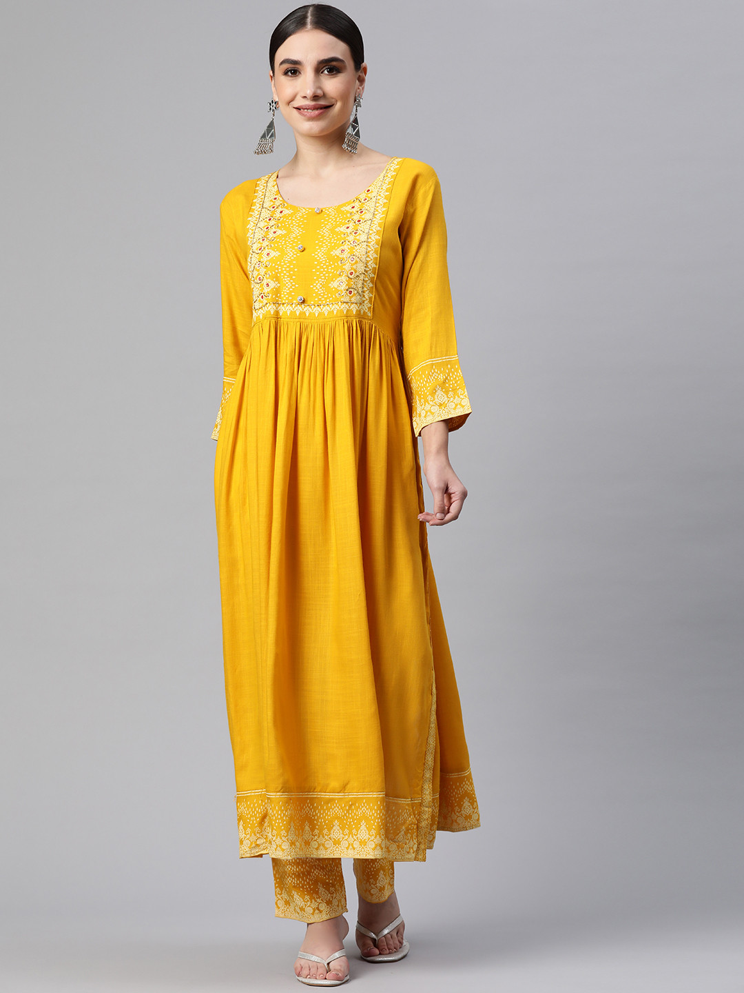 

mokshi Women Yellow Ethnic Motifs Printed Pleated Beads and Stones Kurta with Trousers