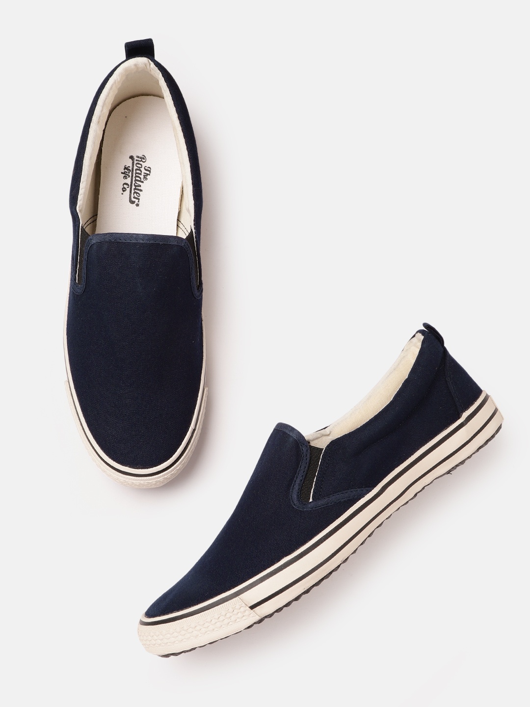 

Roadster Men Navy Blue Solid Canvas Slip-On Sneakers