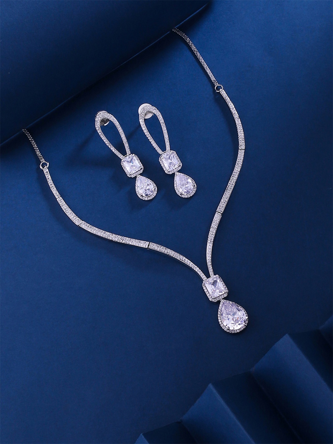 

Yellow Chimes Rhodium Plated American Diamond Studded Jewellery Set, Silver
