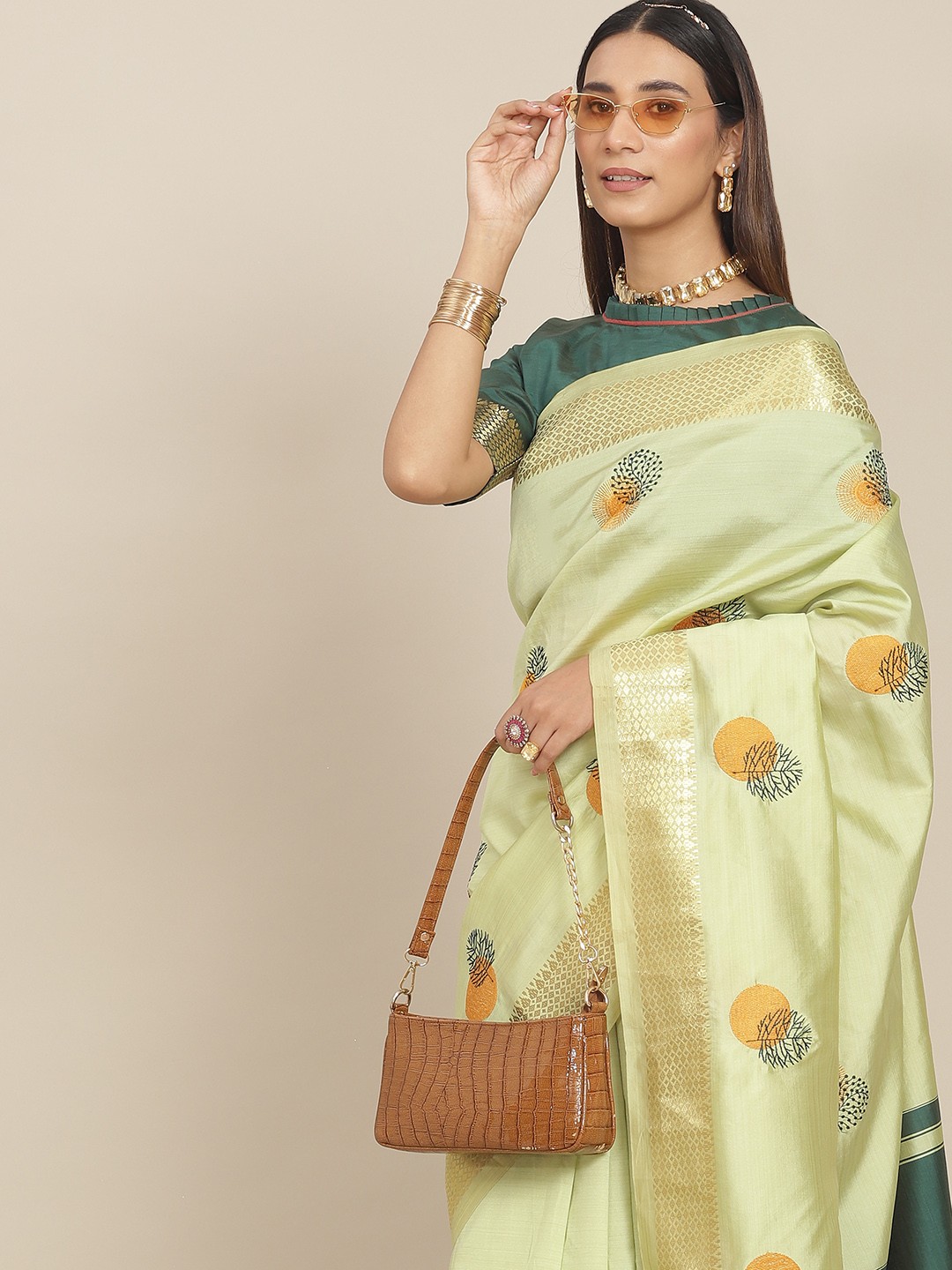 

Mitera Green & Yellow Floral Zari Silk Cotton Saree