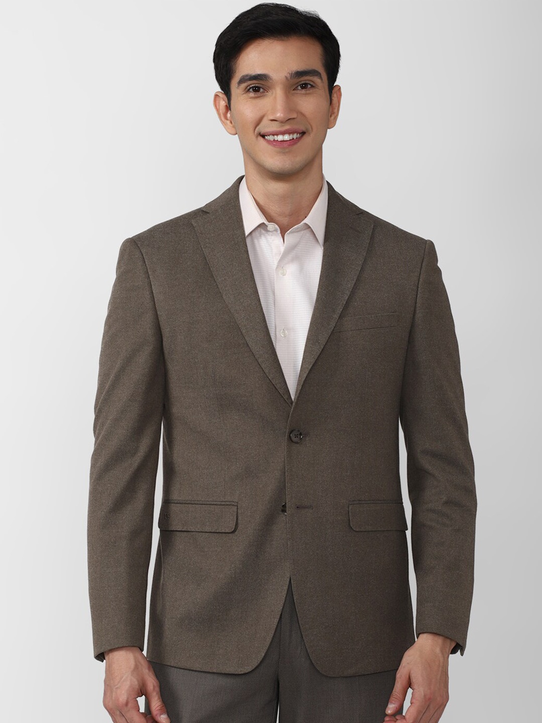 

Peter England Elite Men Brown Solid Slim-Fit Blazers
