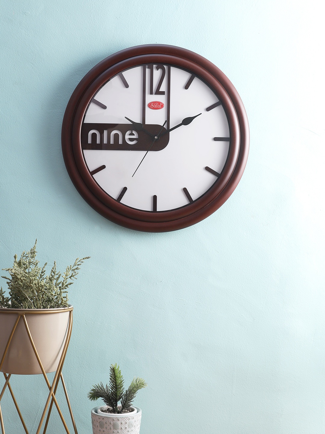 

Safal Brown & White Contemporary Wall Clock With Artistic Laser Cut Numerals