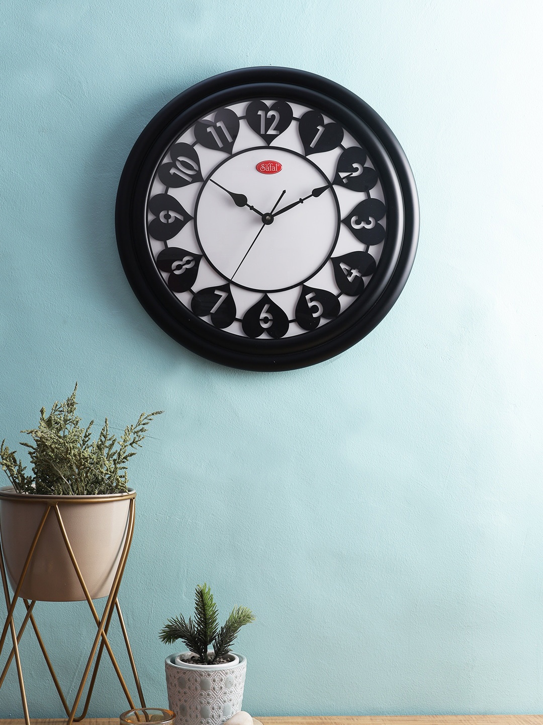 

Safal Black & White Contemporary Wall Clock