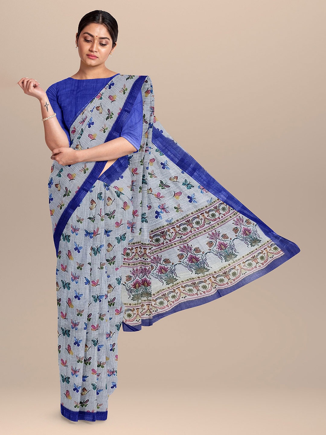 

The Chennai Silks Blue & Grey Floral Zari Linen Blend Fusion Saree