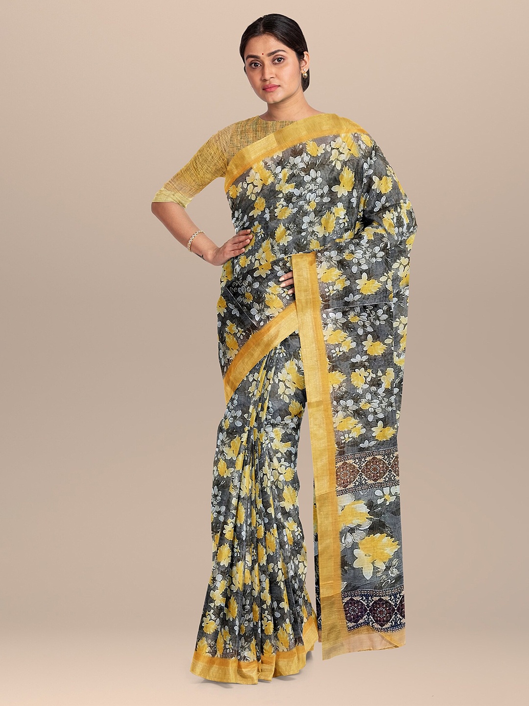 

The Chennai Silks Grey & Yellow Floral Zari Linen Blend Saree