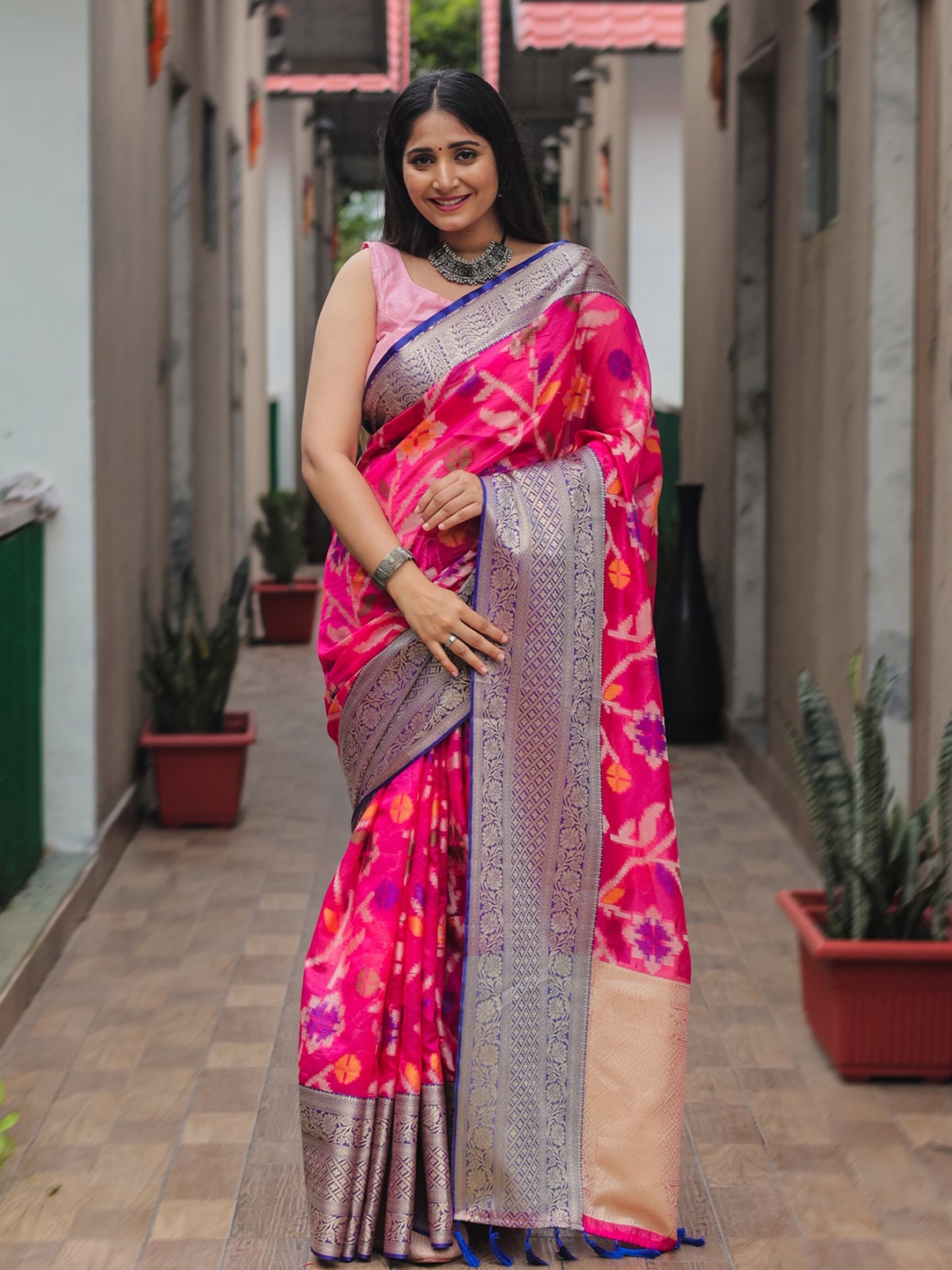 

Mitera Pink & Blue Woven Design Zari Organza Kanjeevaram Saree