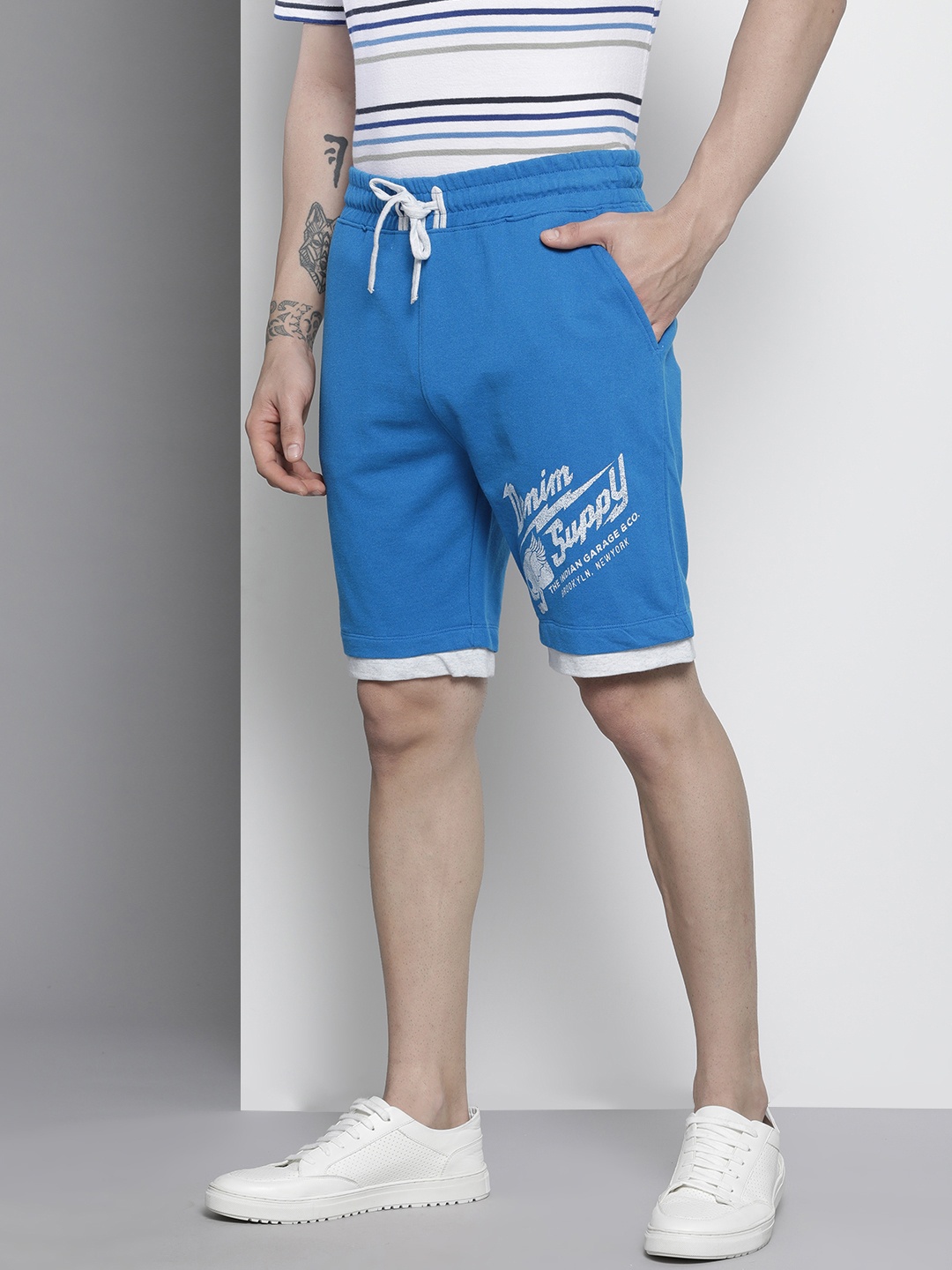 

The Indian Garage Co Men Blue & White Typography Printed Shorts