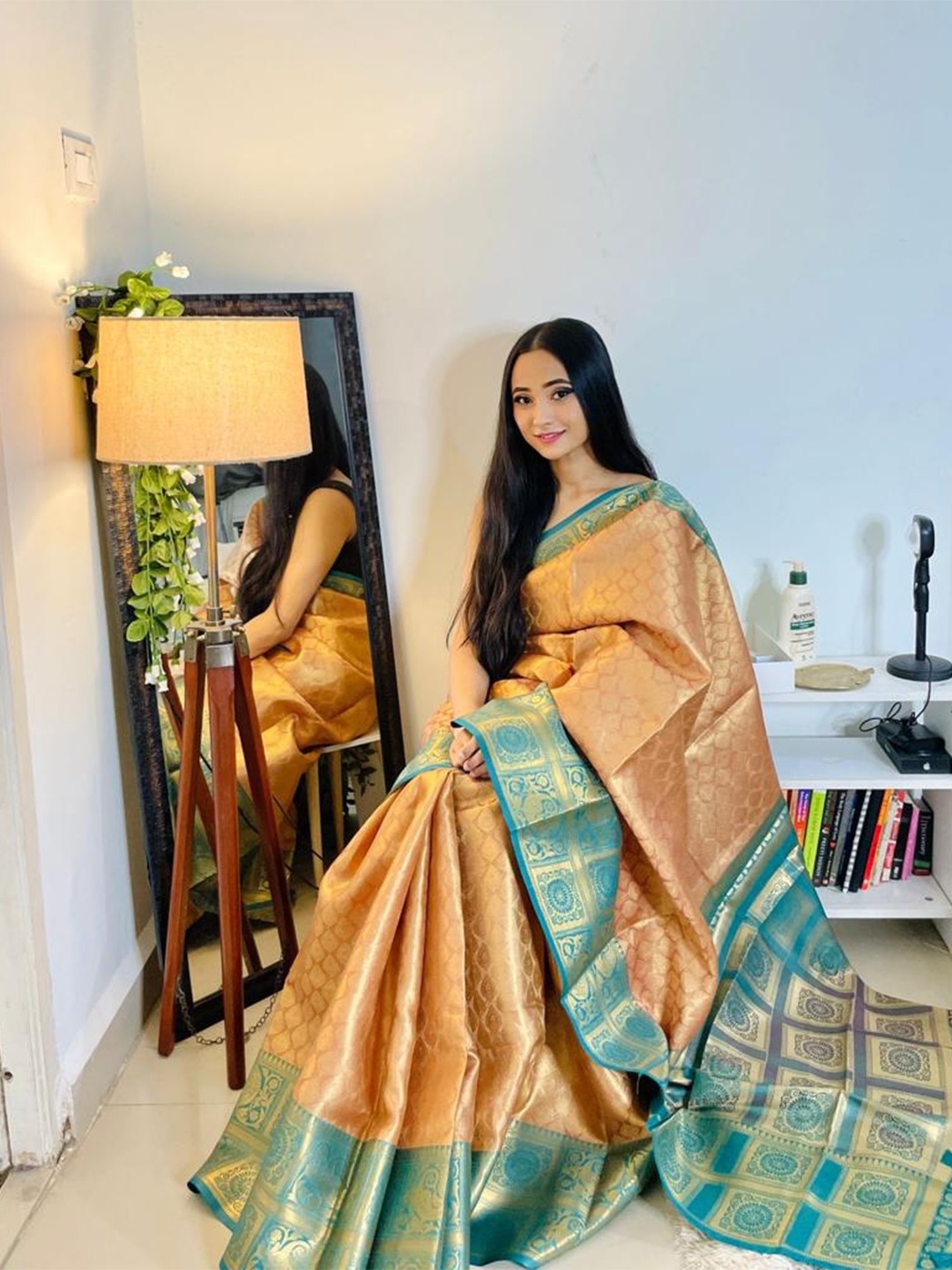 

Mitera Peach-Coloured & Blue Woven Design Zari Organza Kanjeevaram Saree