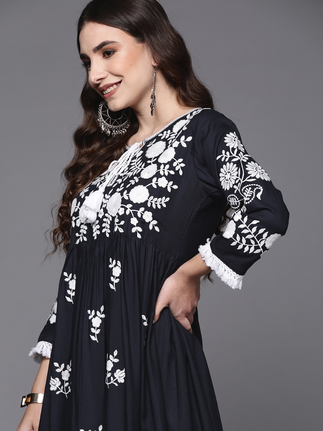 

Indo Era Navy Blue & White Floral Embroidered Tie-Up Neck Ethnic A-Line Midi Dress