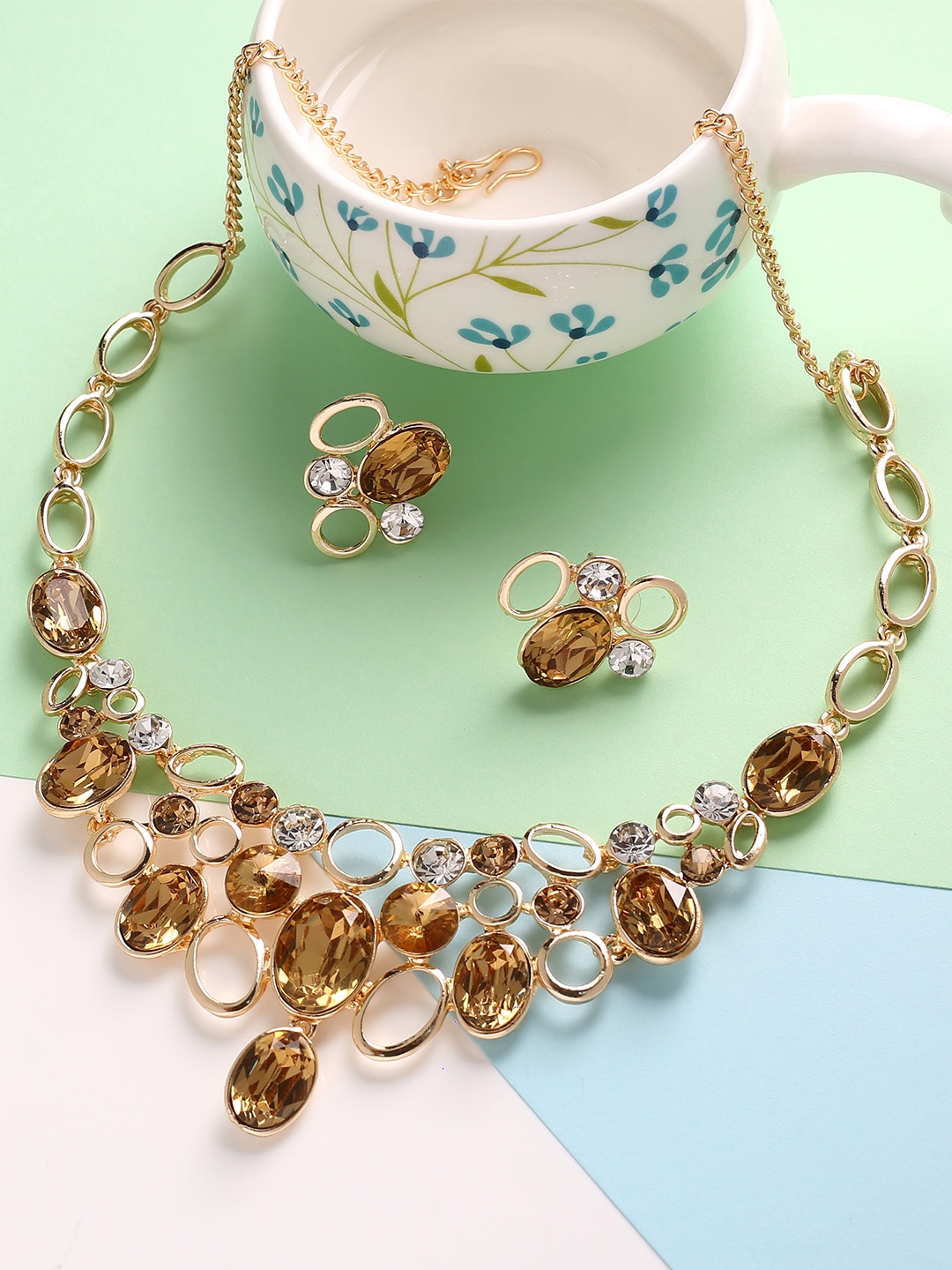

MAD CLUB Women Gold-Plated & White AD Stone-studded Jewellery Set