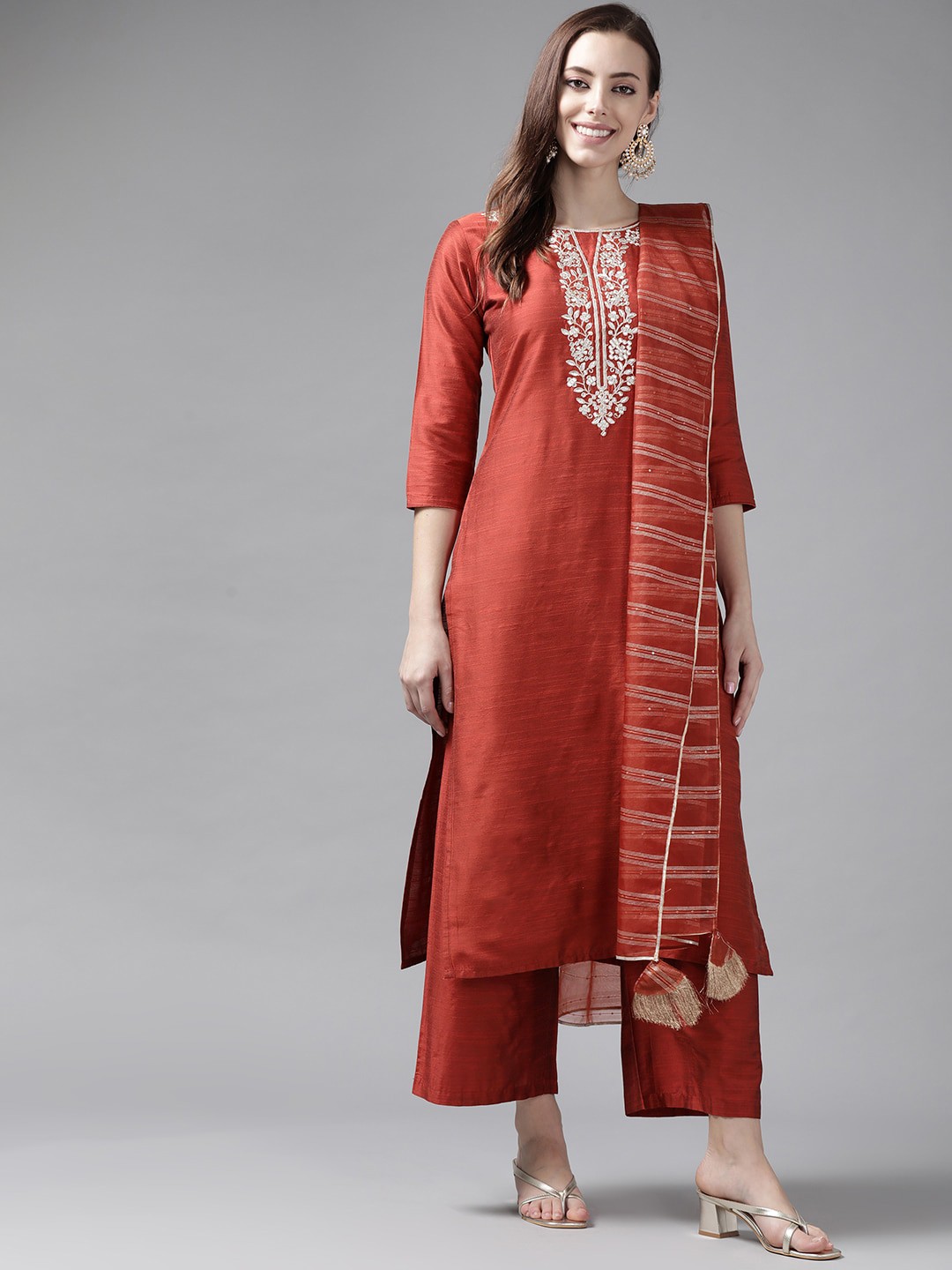 

Indo Era Women Orange Floral Yoke Design Chanderi Silk Kurta with Palazzos & With Dupatta