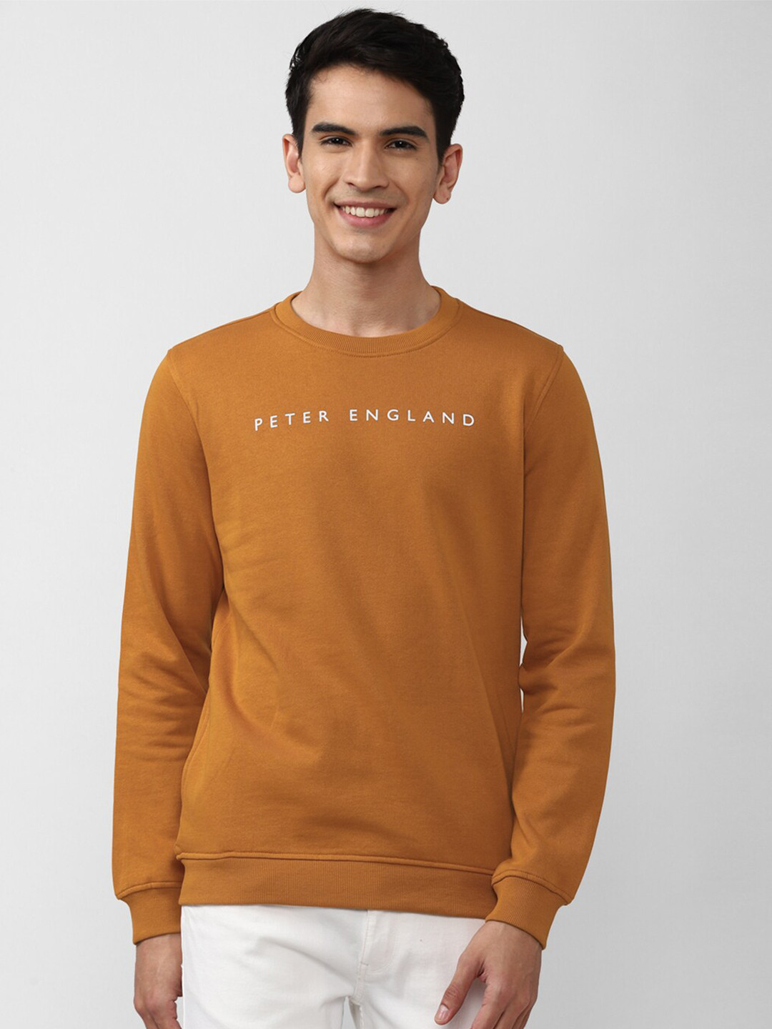 

Peter England Casuals Men Orange Printed Sweatshirt
