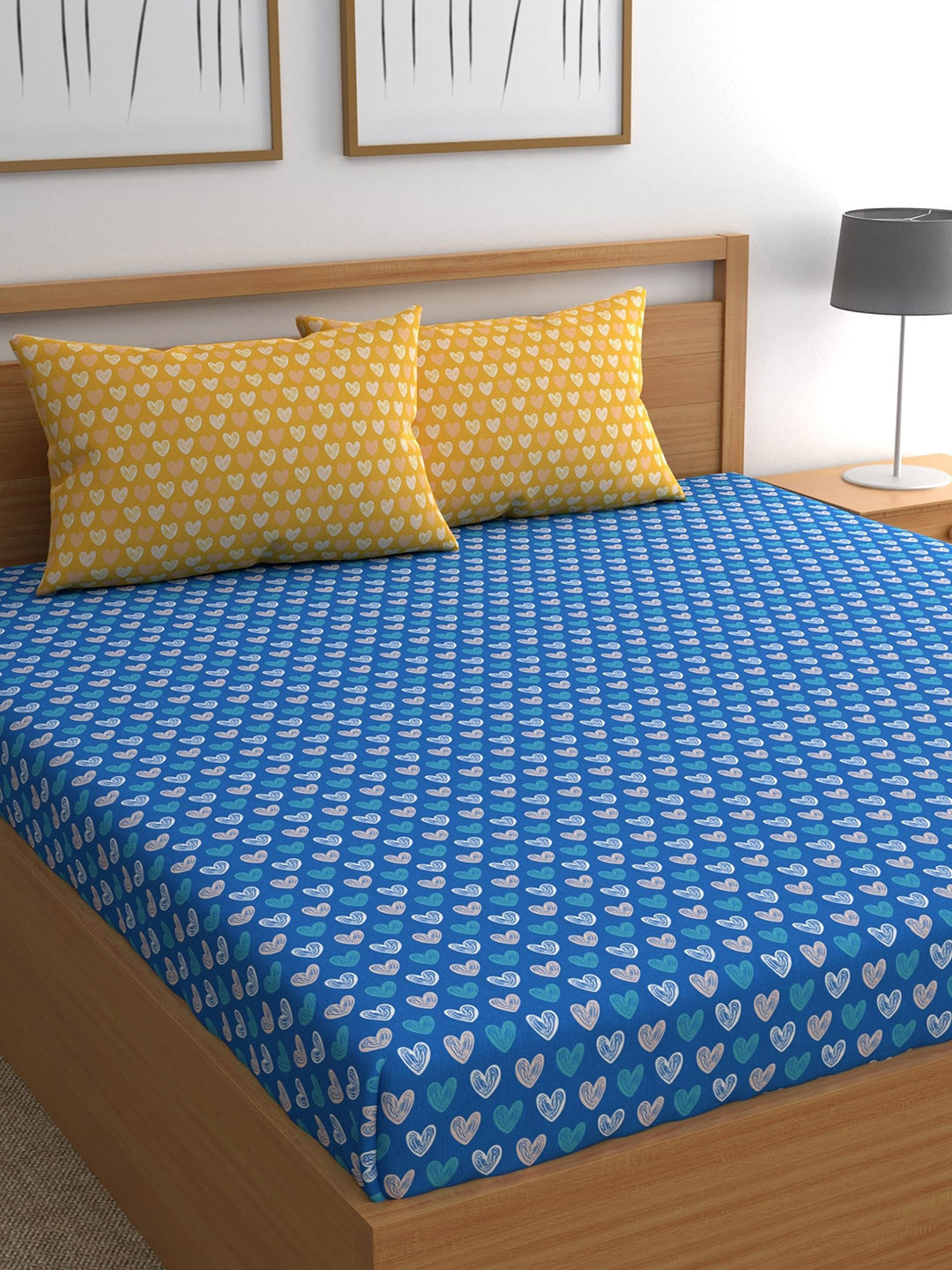 

CHHAVI INDIA Blue & Yellow Graphic 210 TC Queen Bedsheet with 2 Pillow Covers