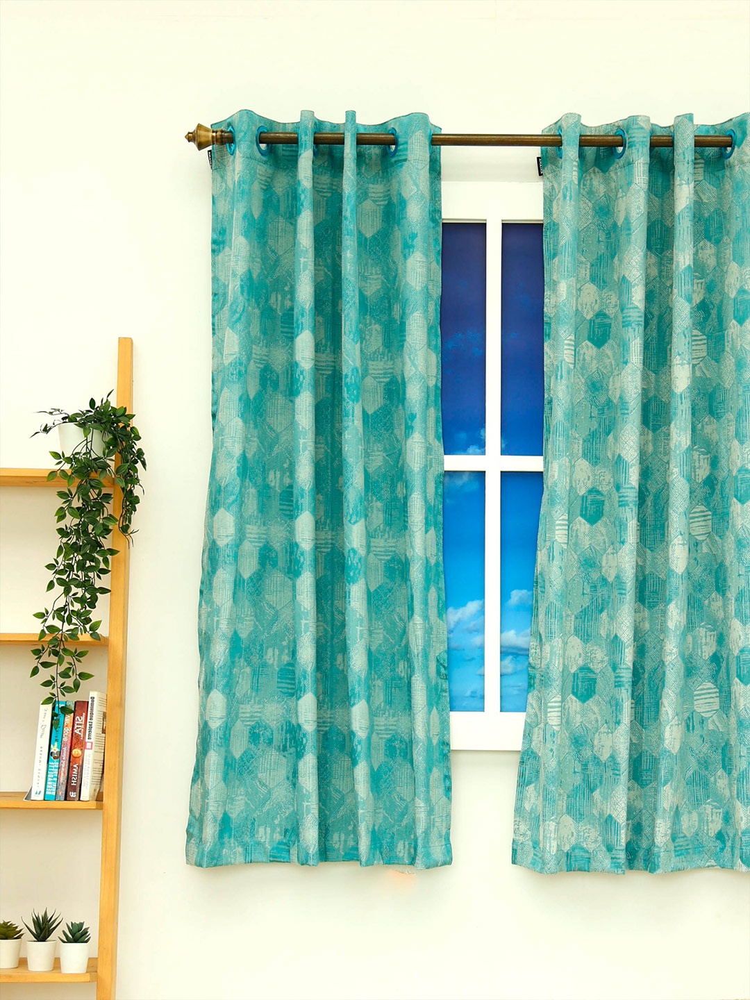 

Ariana Turquoise Blue & Beige Printed Black Out Polyester Window Curtain