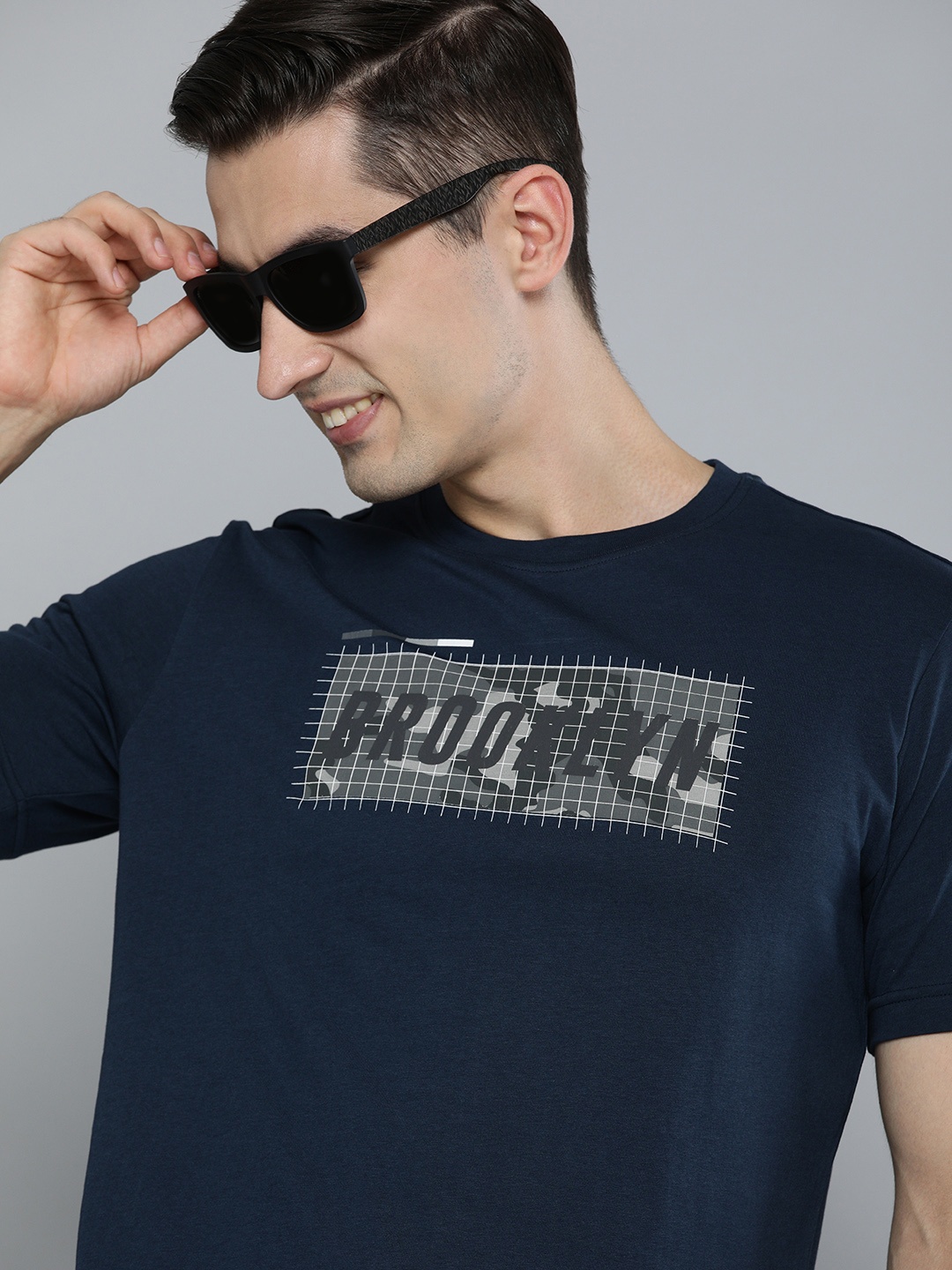 

HERE&NOW Men Navy Blue Typography Printed Pure Cotton T-shirt