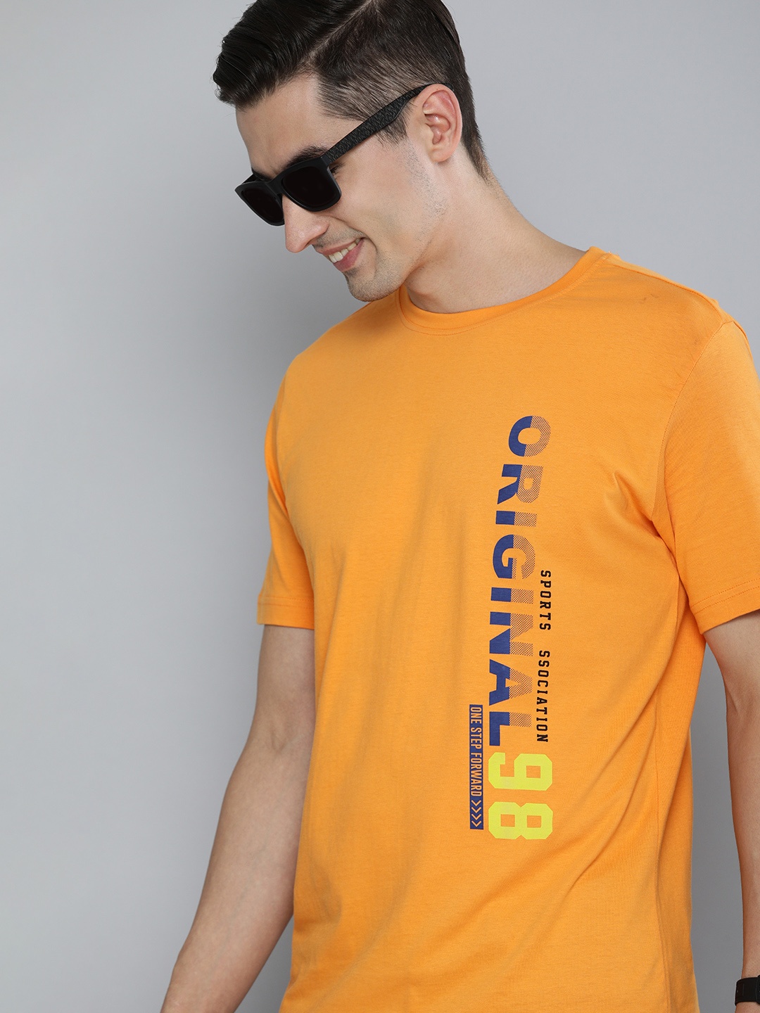 

HERE&NOW Men Orange Typography Printed Pure Cotton T-shirt