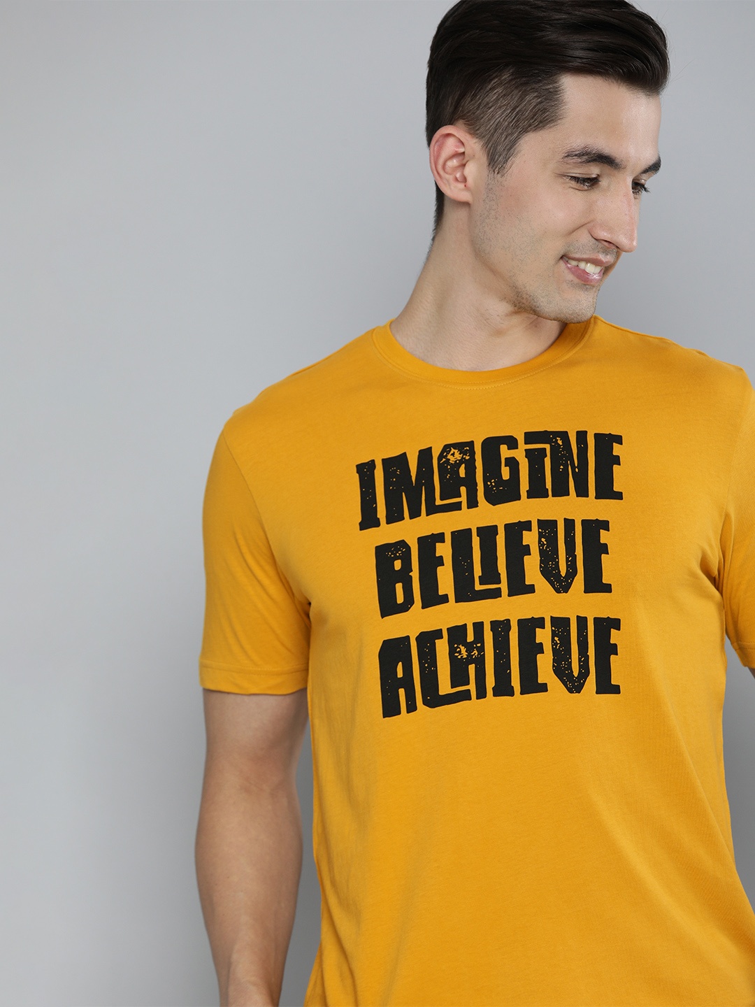 

HERE&NOW Men Mustard Yellow & Black Typography Printed Pure Cotton T-shirt