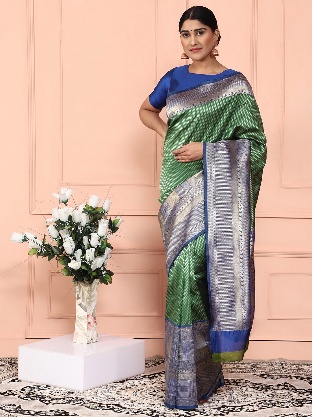 

Glemora Green & Blue Woven Design Zari Silk Blend Kanjeevaram Saree