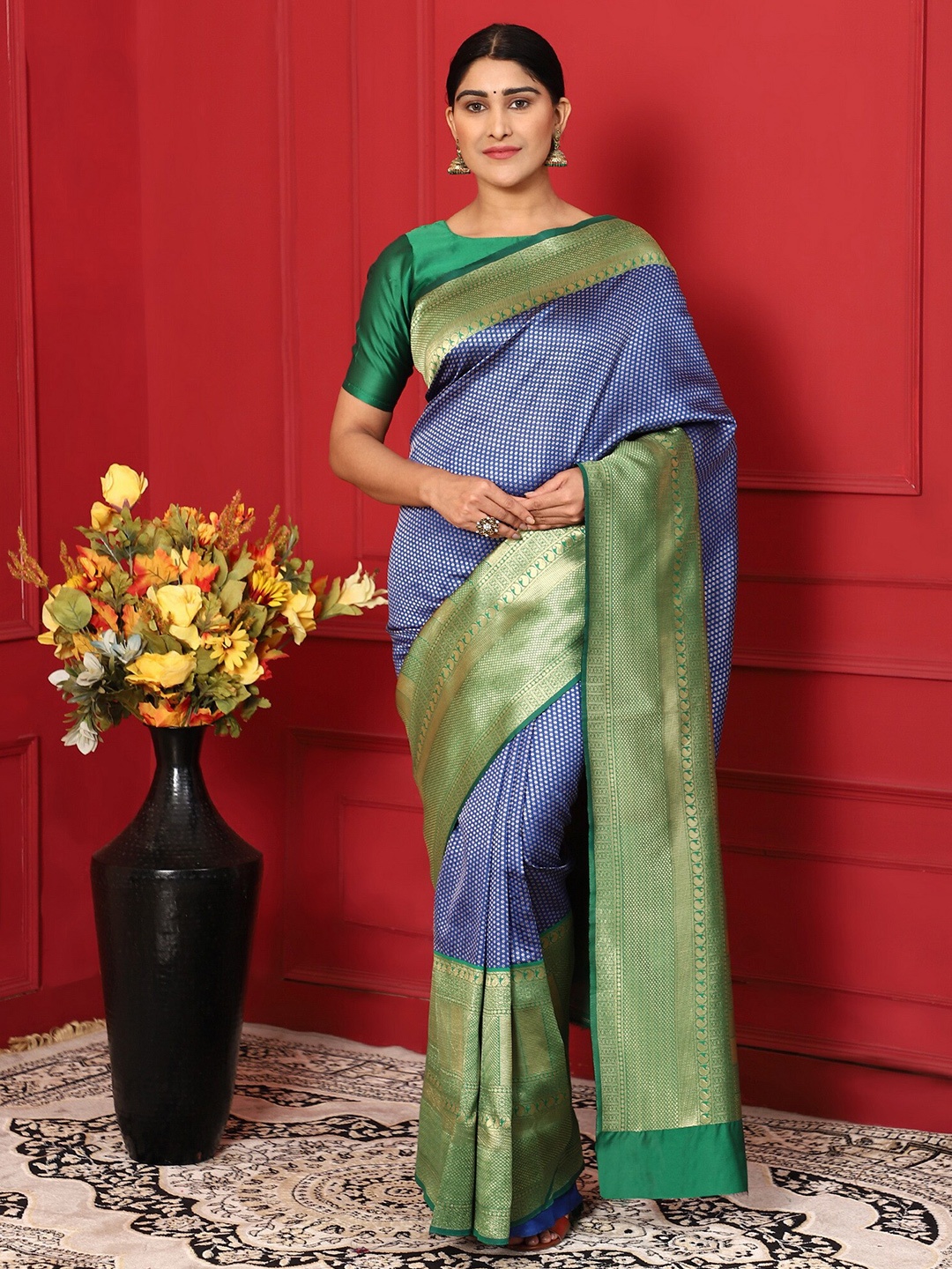 

Glemora Blue & Green Woven Design Zari Silk Blend Kanjeevaram Saree