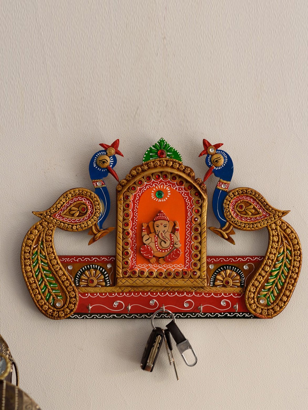

eCraftIndia Red Lord Ganesha and Peacocks Wooden Key Holder