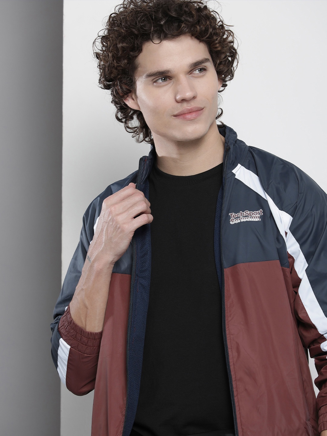 

The Indian Garage Co Men Brown & Navy Blue Colourblocked Windcheater Bomber Jacket