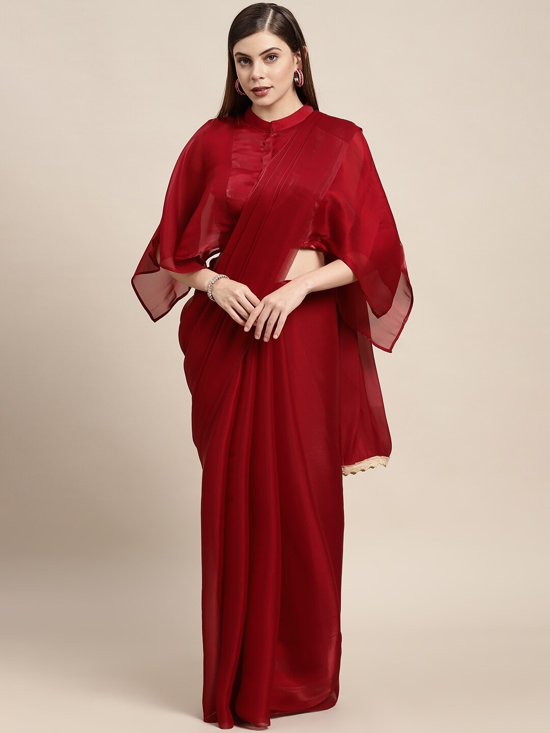 

AVANSHEE Maroon Solid Tissue Saree With Blouse Piece