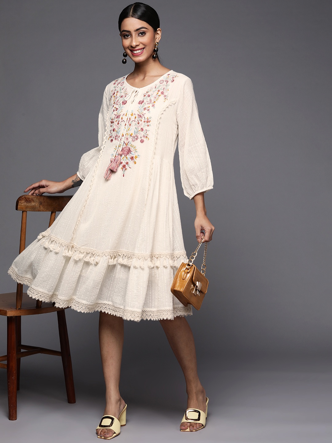 

Indo Era White Embroidered Tie-Up Neck Ethnic A-Line Midi Dress