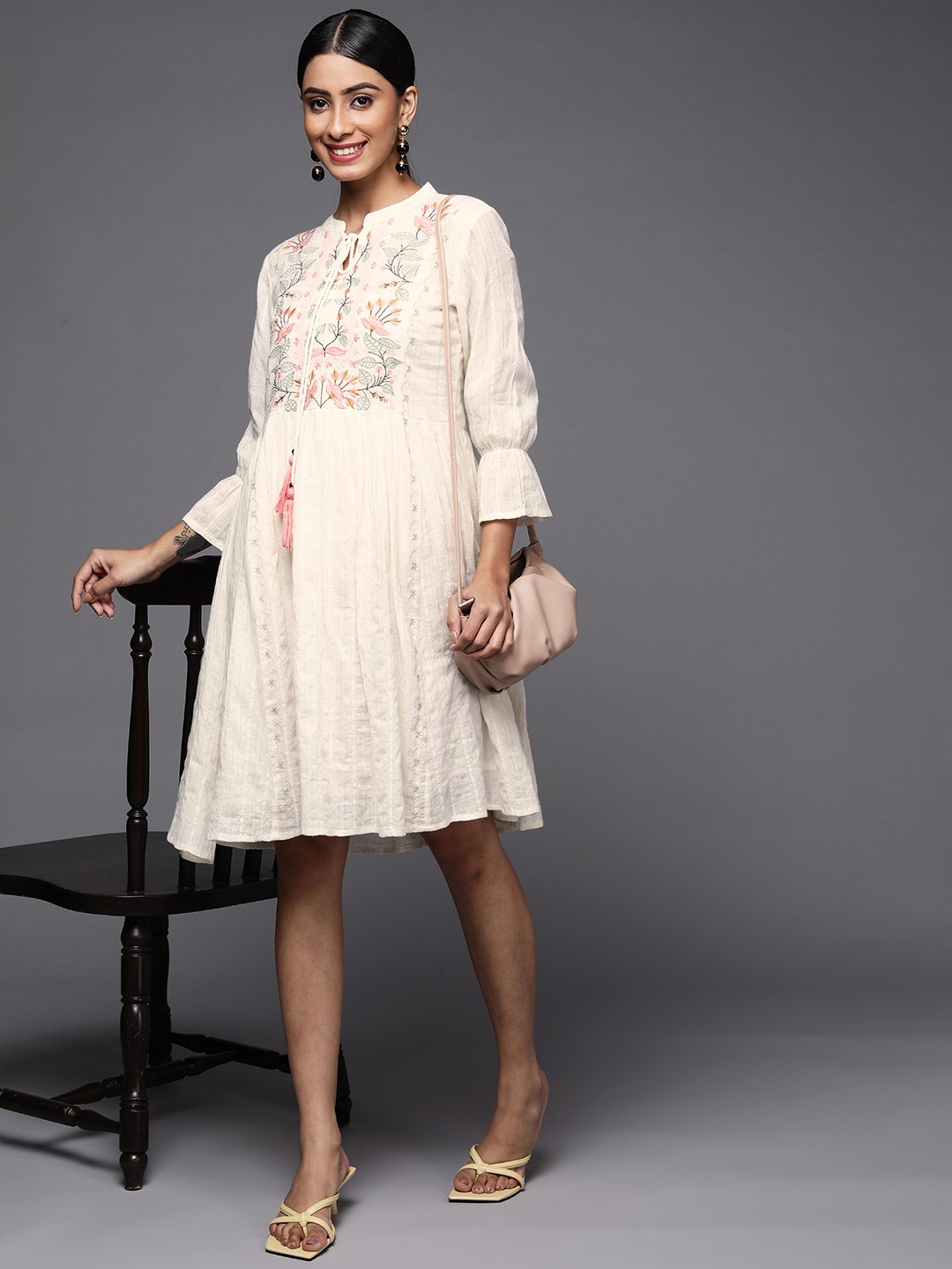 

Indo Era White Floral Embroidered Tie-Up Neck Ethnic A-Line Dress