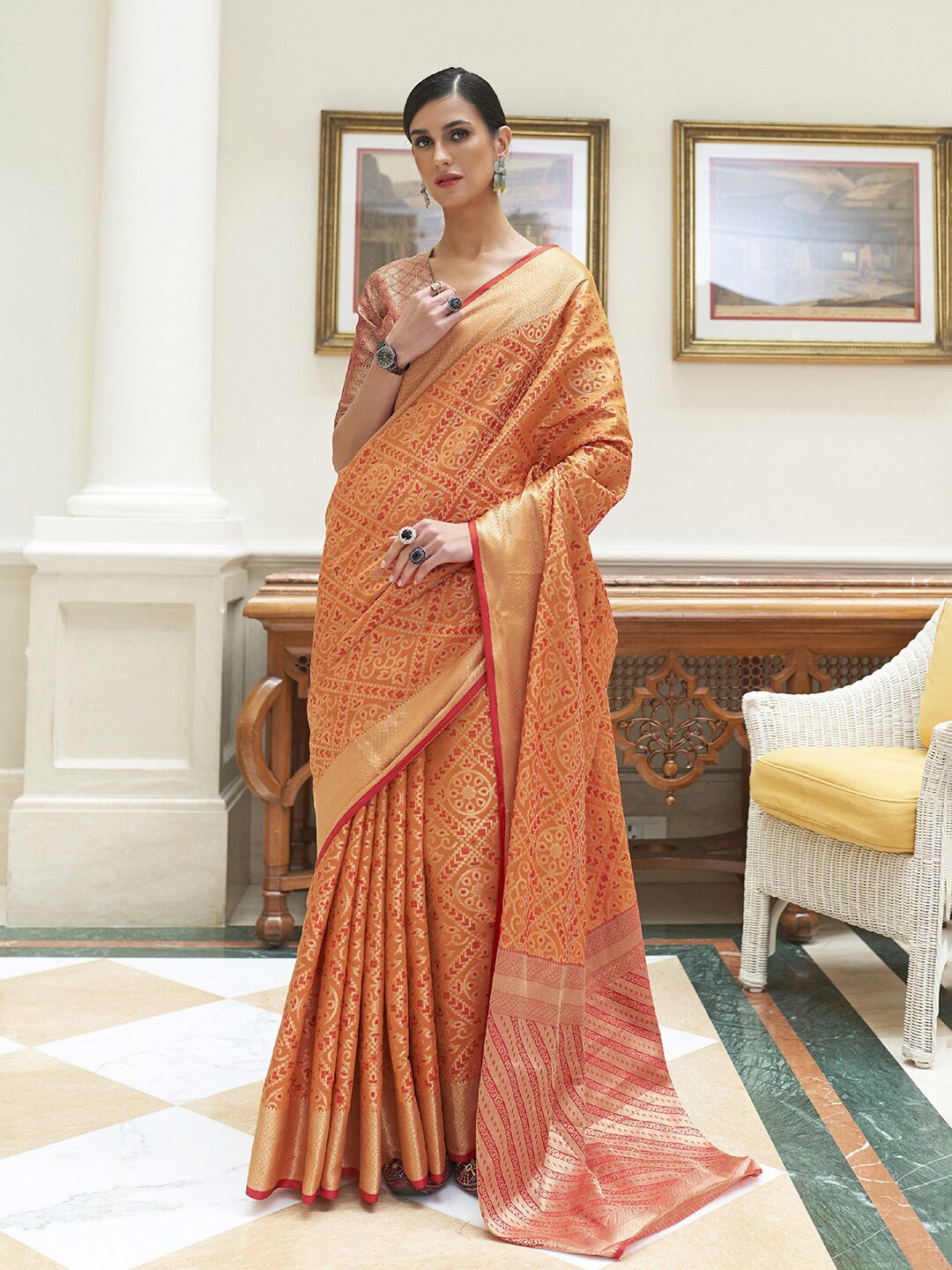 

Mitera Mustard & Red Woven Design Zari Silk Blend Patola Saree
