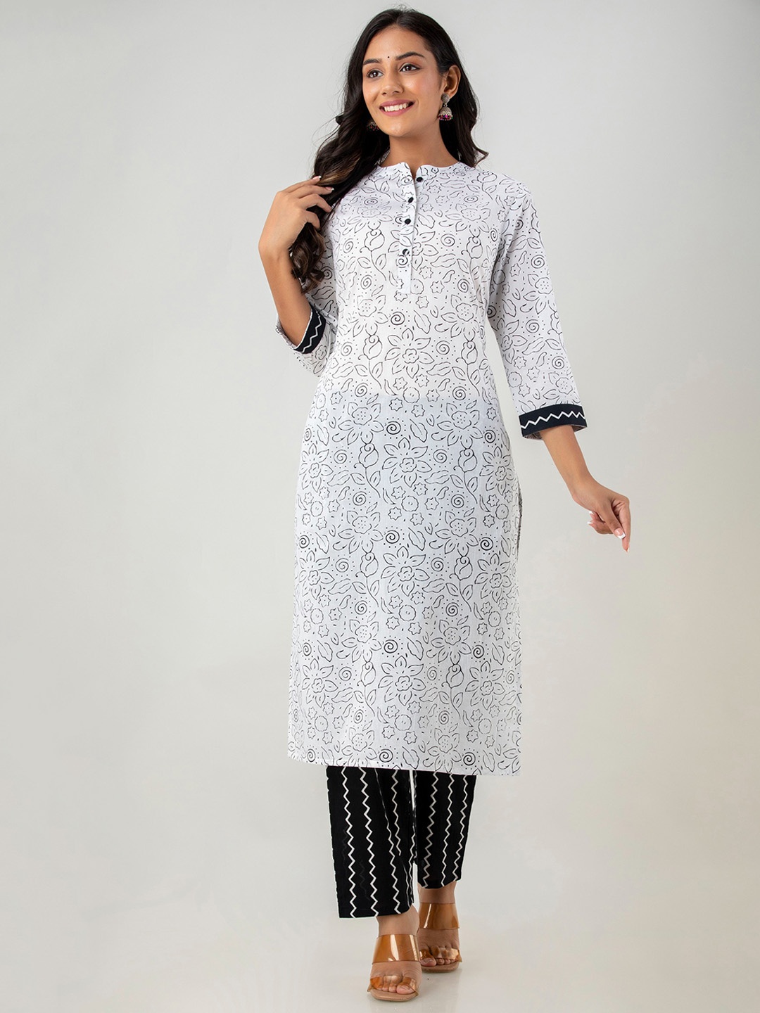 

Sutidora Women White Ethnic Motifs Printed Panelled Pure Cotton Kurti with Trousers