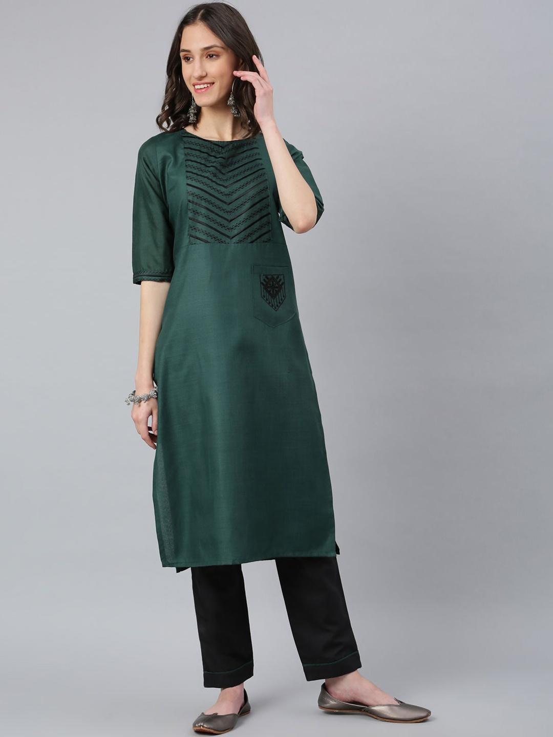 

Lilots Women Teal Yoke Design Panelled Thread Work Kurti with Trousers