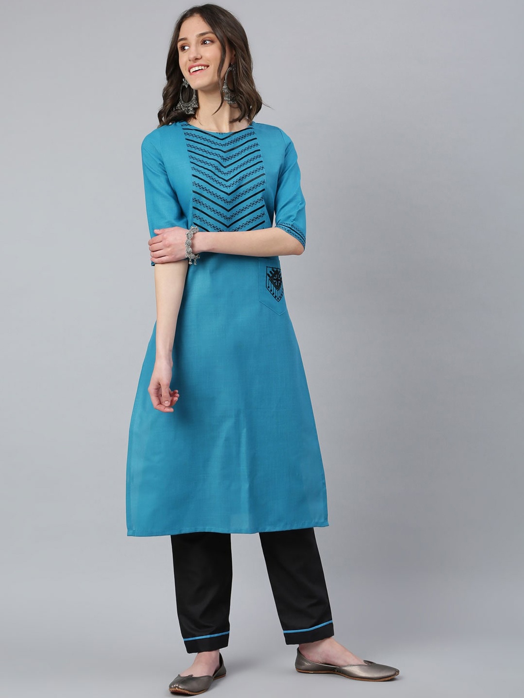 

Lilots Women Blue Panelled Thread Work Kurti with Trousers