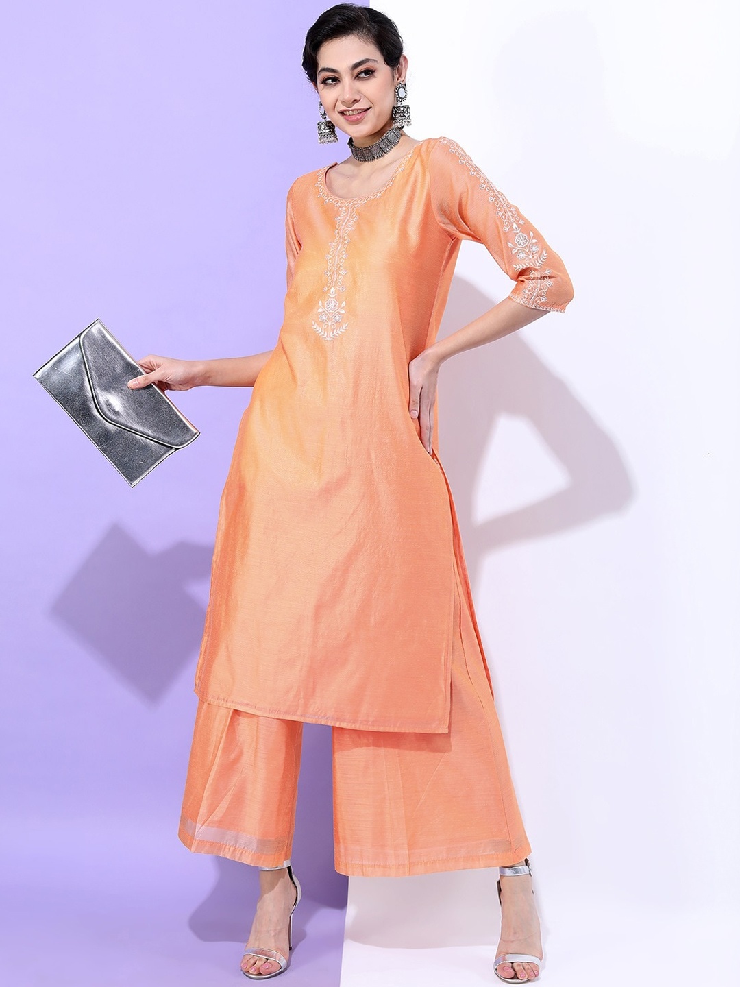 

Vishudh Women Orange Embroidered Chanderi Cotton Kurta with Palazzo set