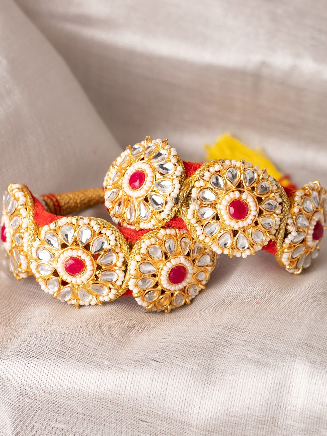 

Sanjog Women Set of 2 Gold-Plated & Red Kundan & Thread Rajasthani Bridal Pochi Bangle