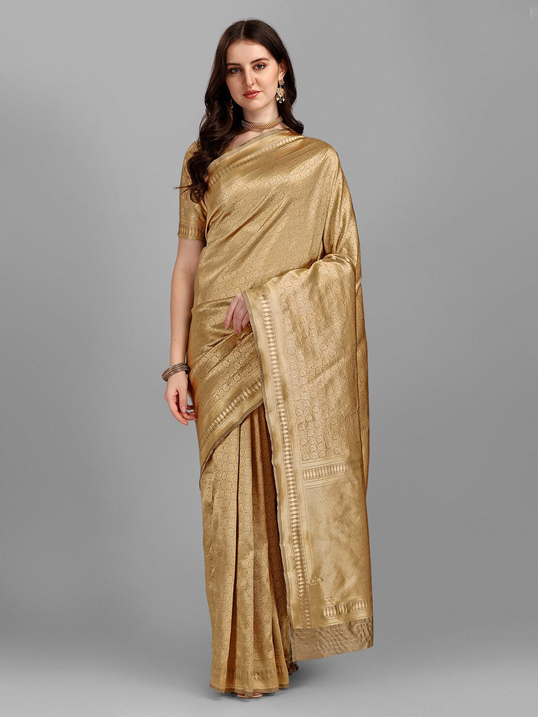 

Ethnic Yard Beige & Gold-Toned Ethnic Motifs Zari Saree