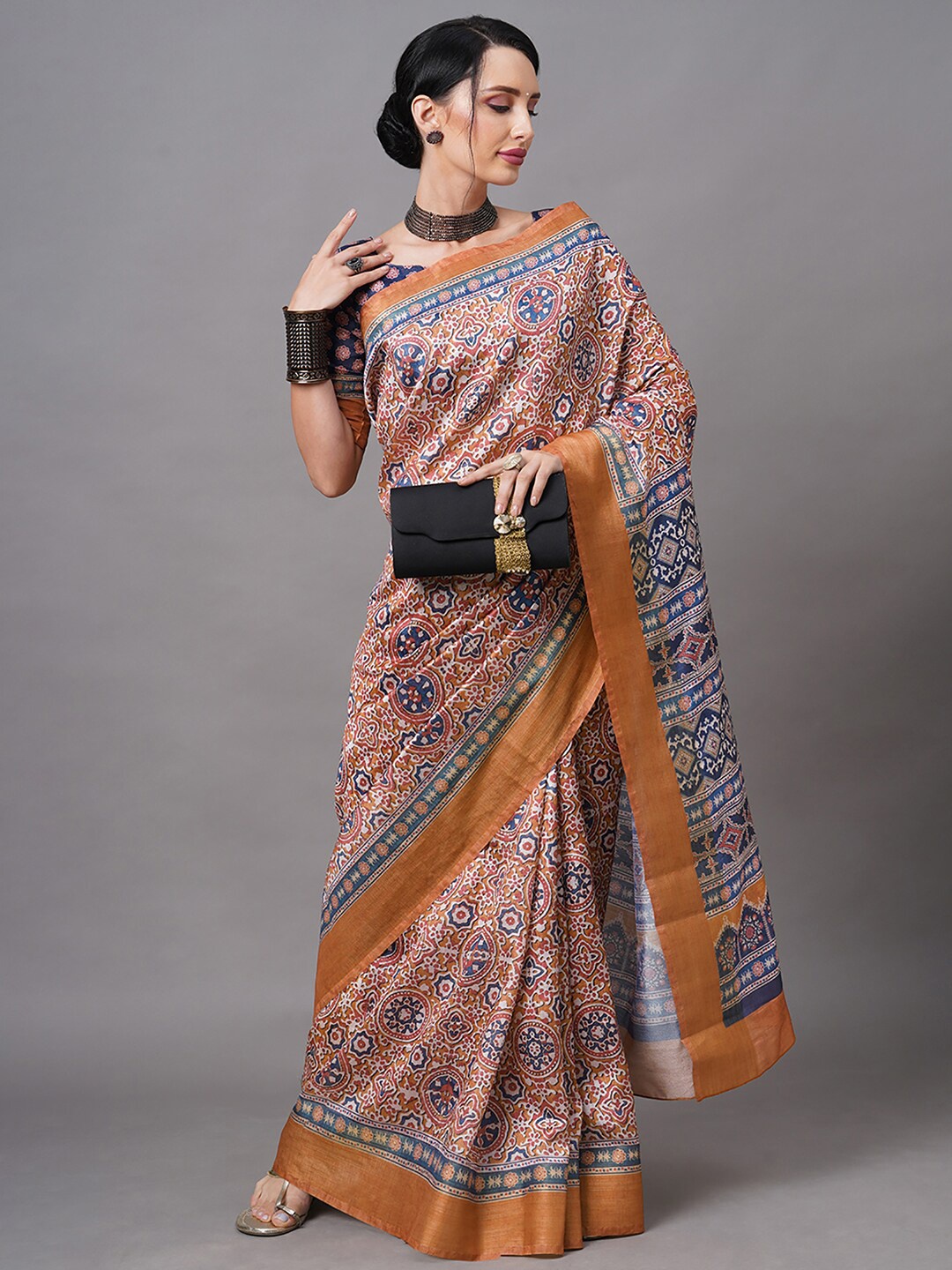 

Mitera Orange & Blue Ethnic Motifs Zari Linen Blend Bagh Saree