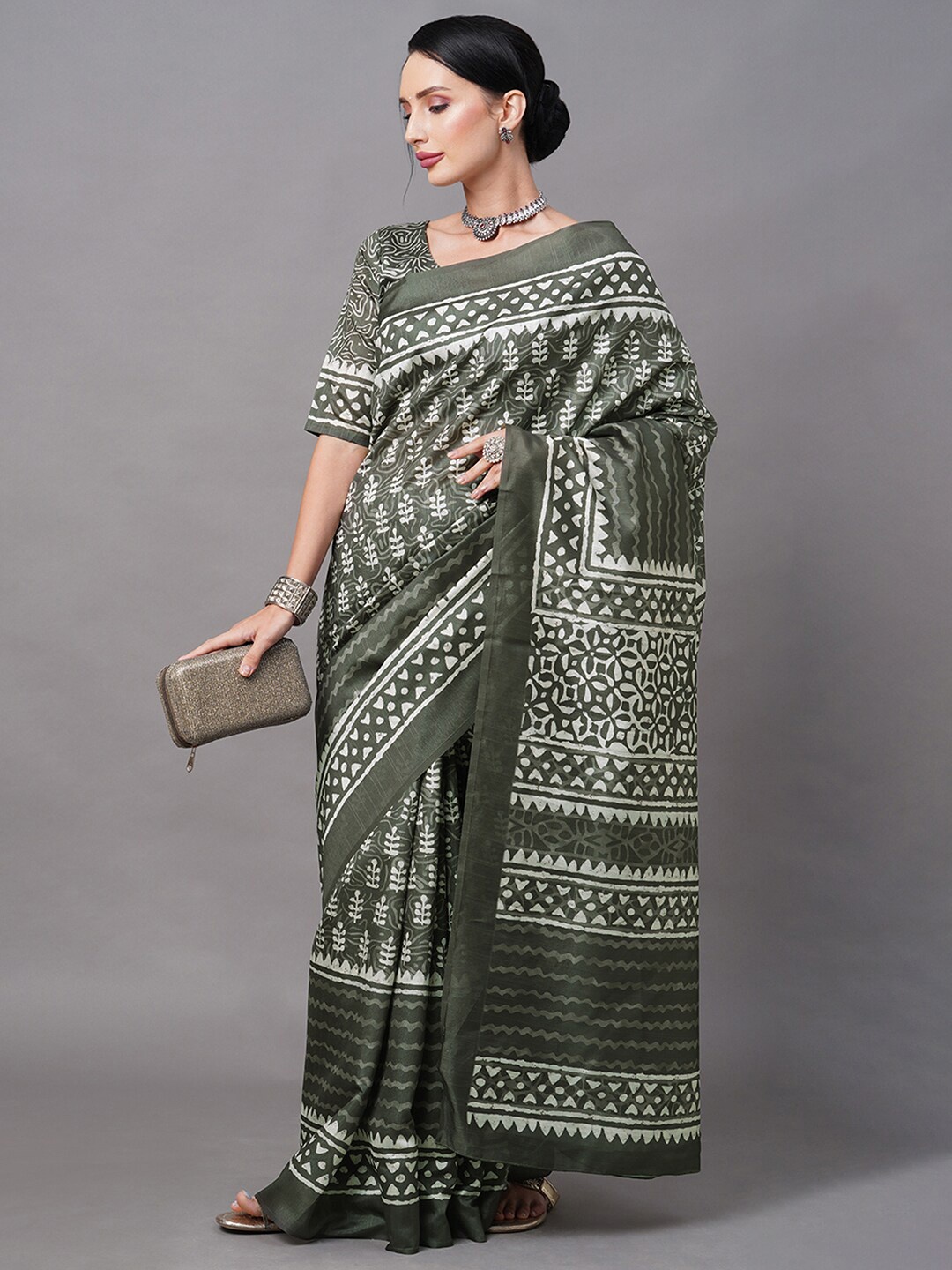 

Mitera Olive Green & White Dabu Art Silk Bagh Saree