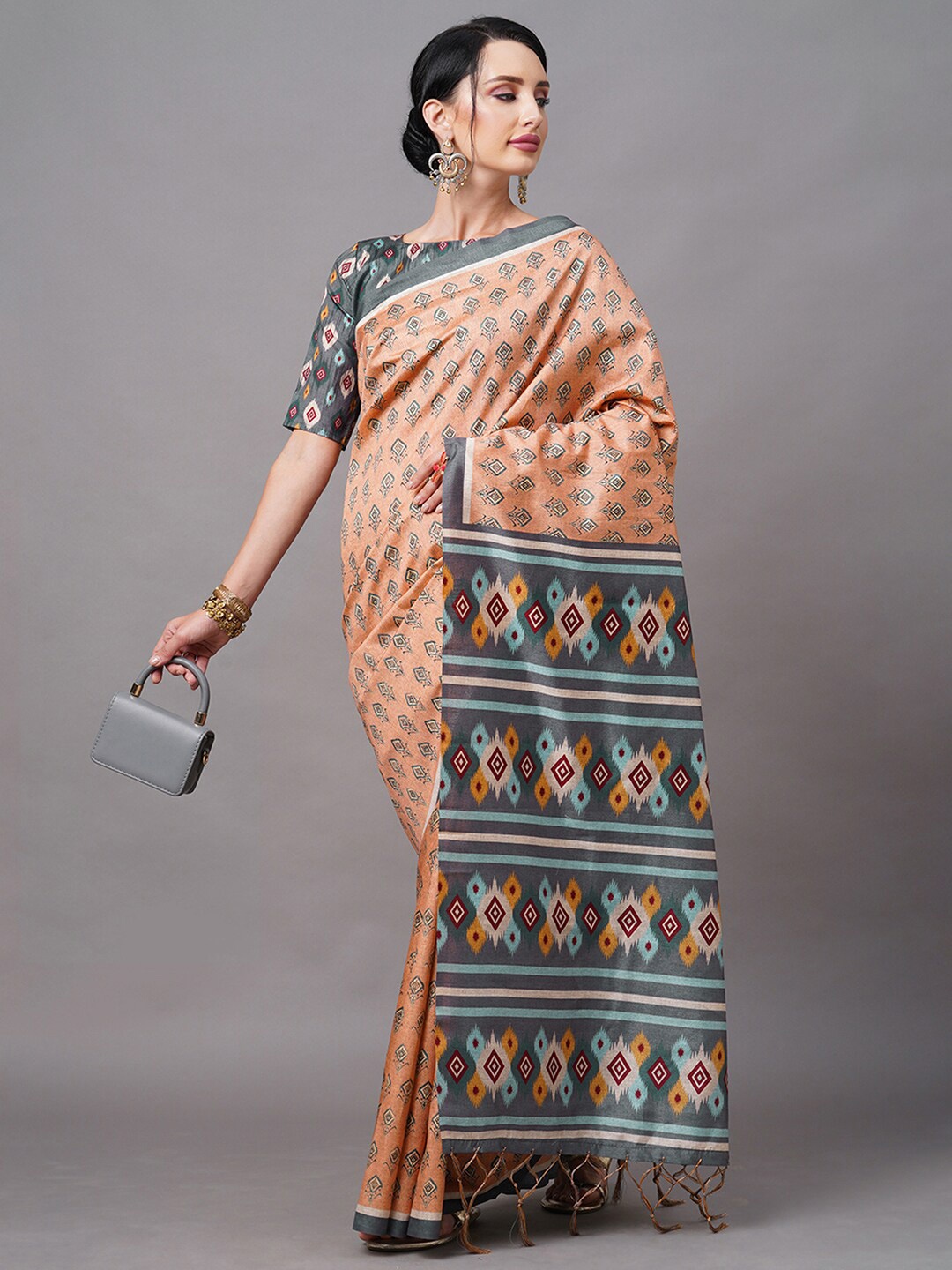 

Mitera Peach-Coloured & Grey Ethnic Motifs Art Silk Ikat Saree